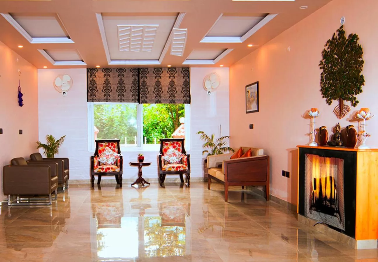 Seating area in DreamCatcher By Samyati Hotels and Resorts