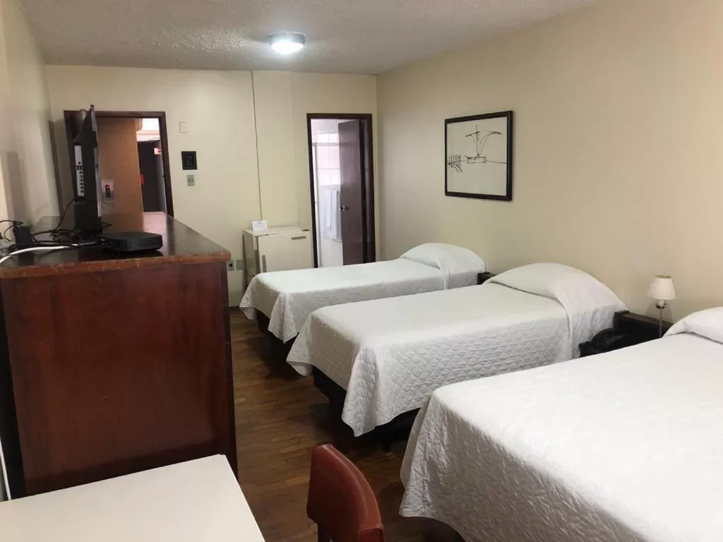 Bed in Hotel Estoril