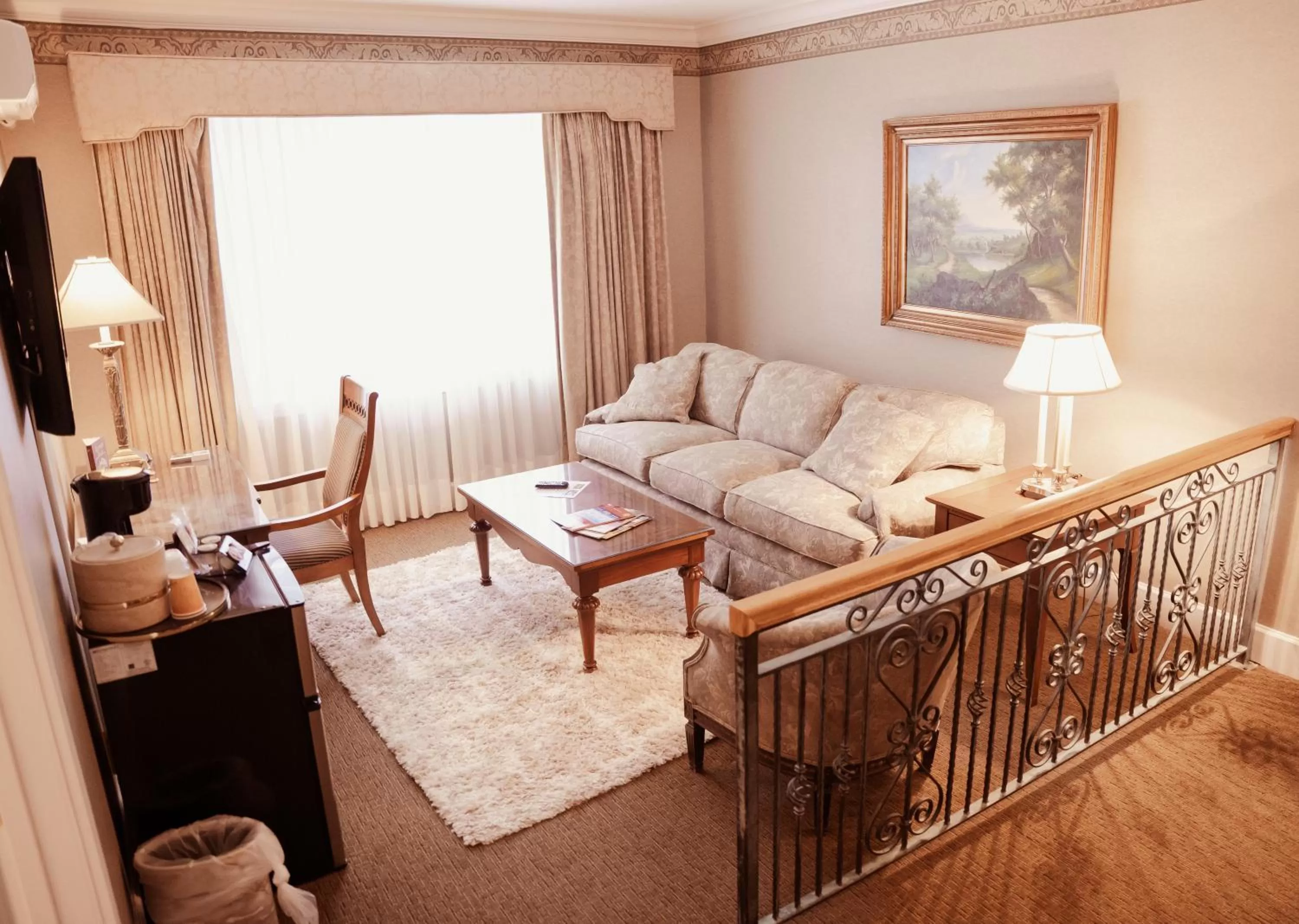 Bed, Seating Area in Phoenix Inn Resort