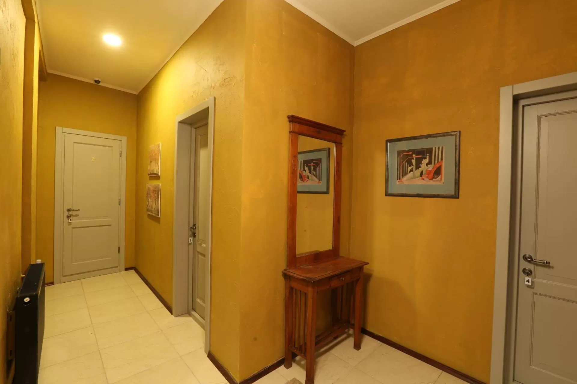 Communal lounge/ TV room in Kindli Boutique Hotel