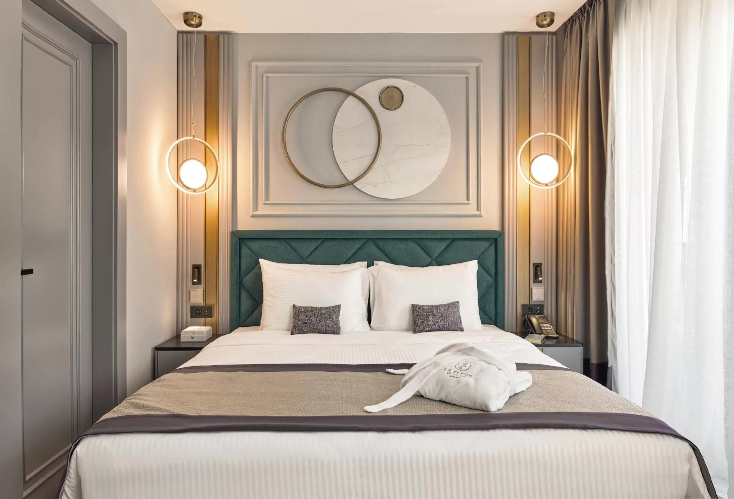 Bed in La Fleur Boutique Hotel