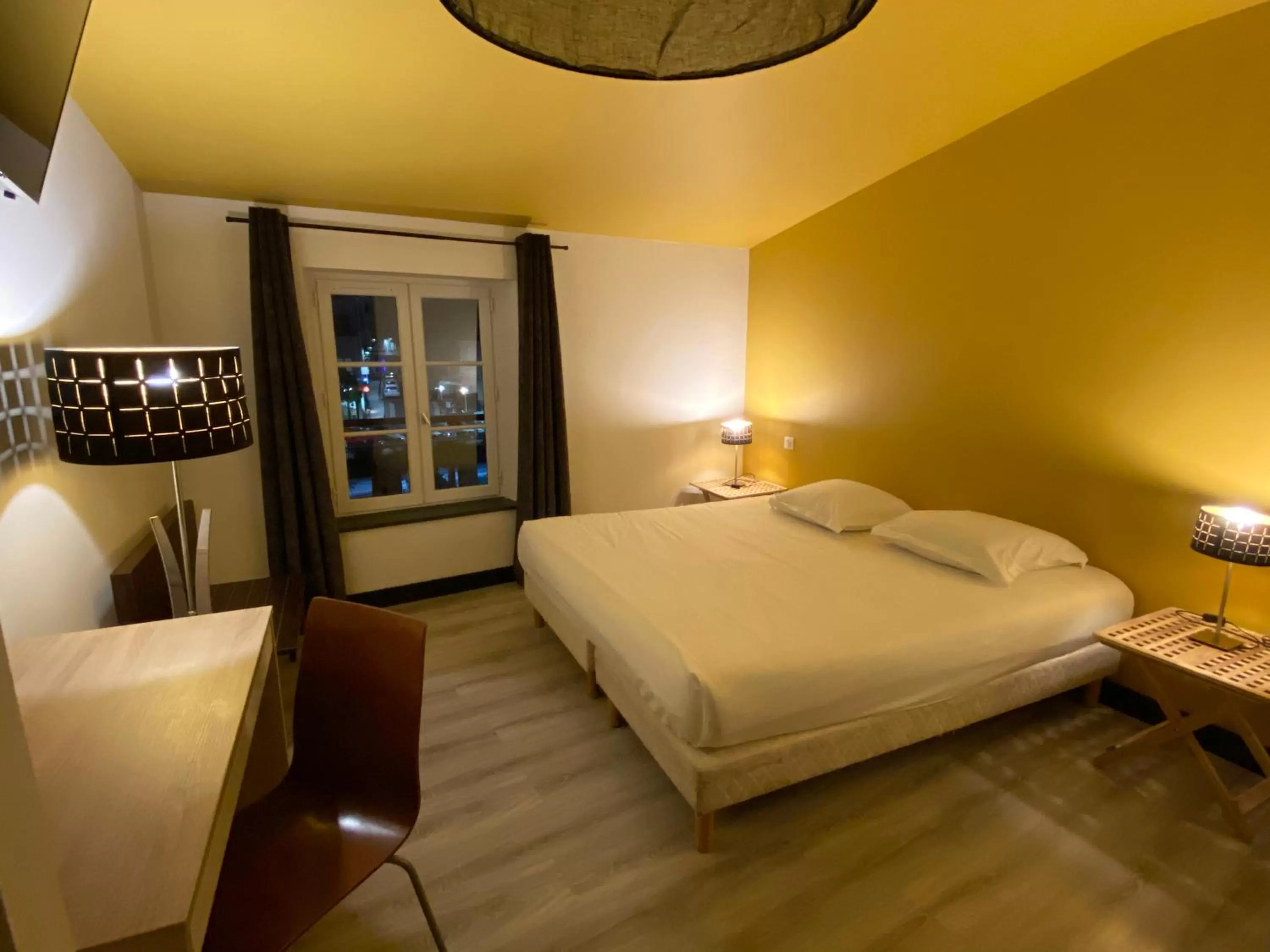 Bedroom in Le Miredames Hôtel-Bar