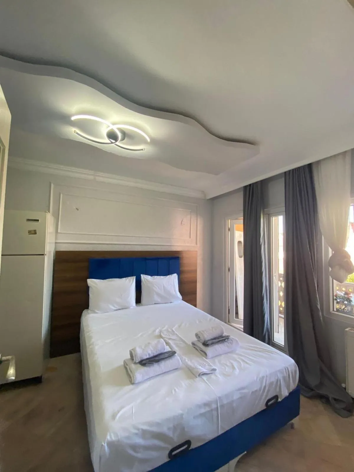 Bed in Aruna Boutique Hotel