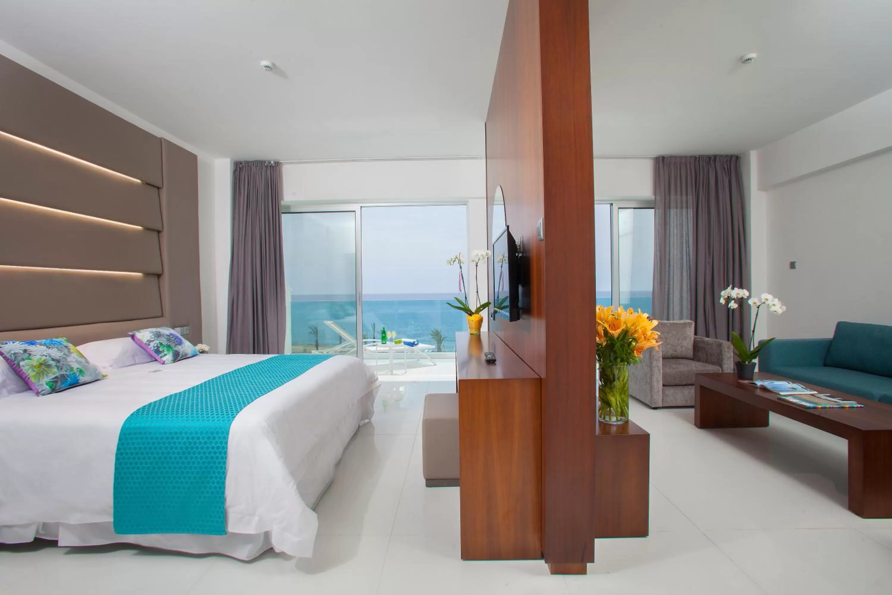 Photo of the whole room, Bed in King Evelthon Beach Hotel & Resort