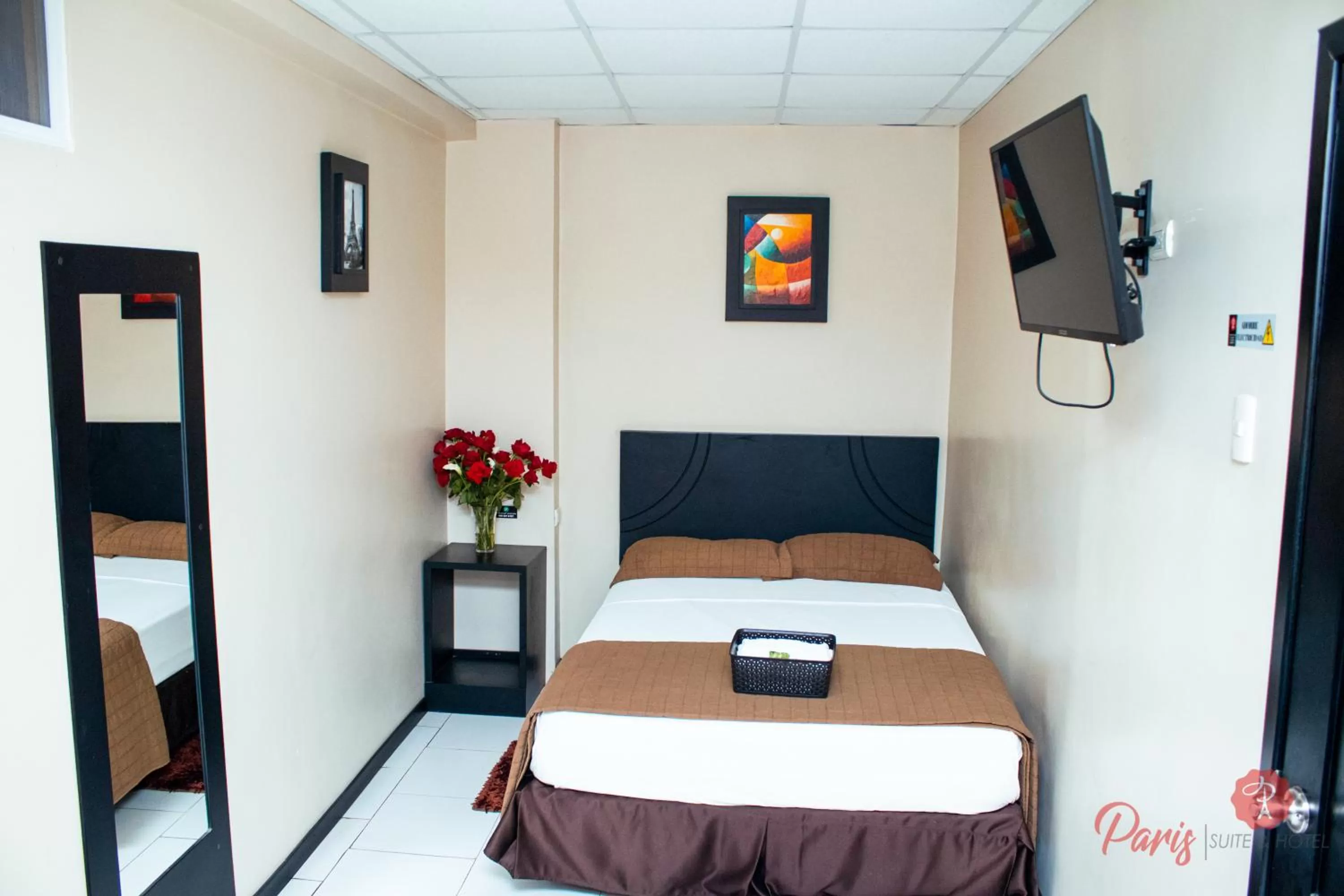 Bed in Paris Suite Hotel