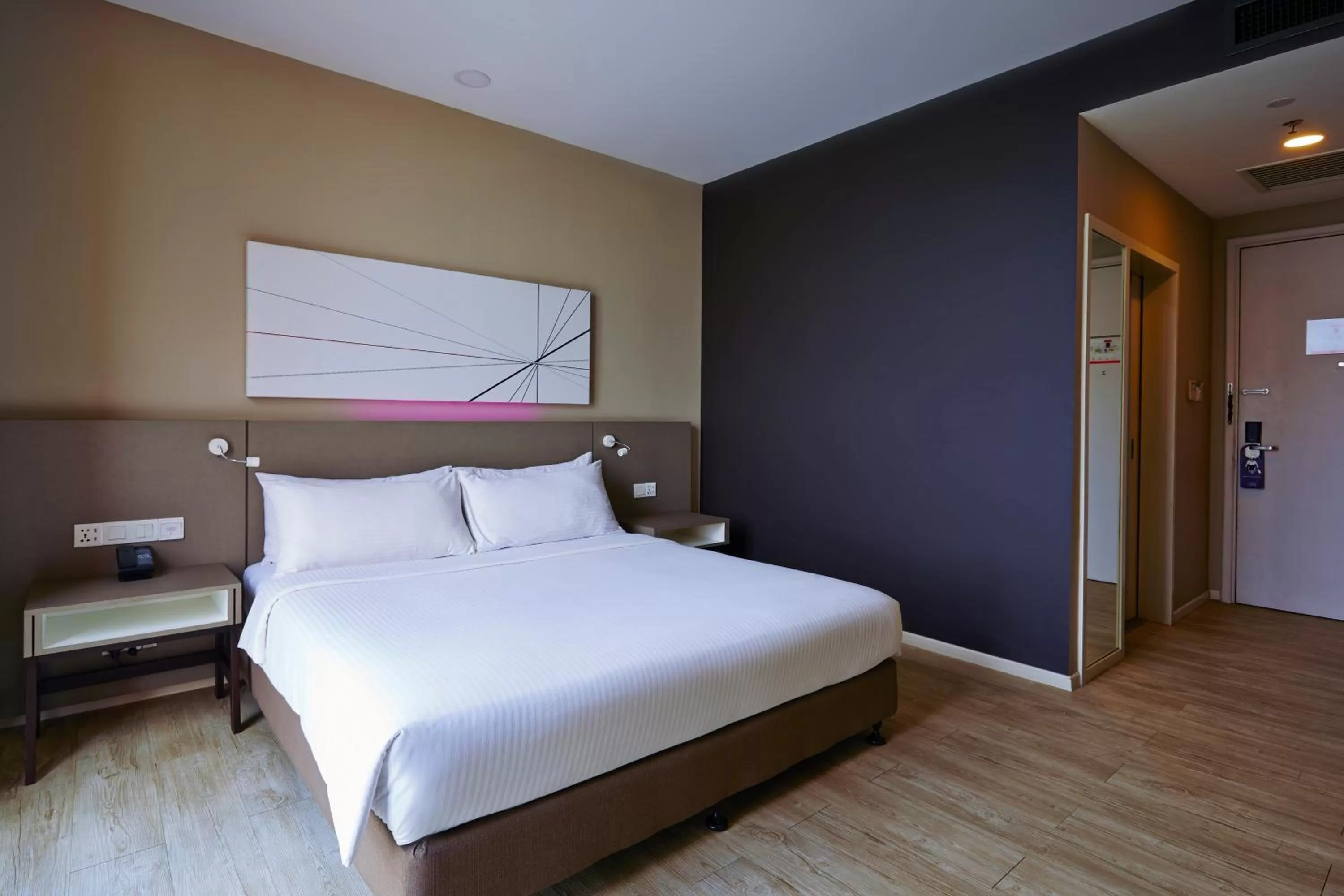 Bed in Qliq Damansara Hotel