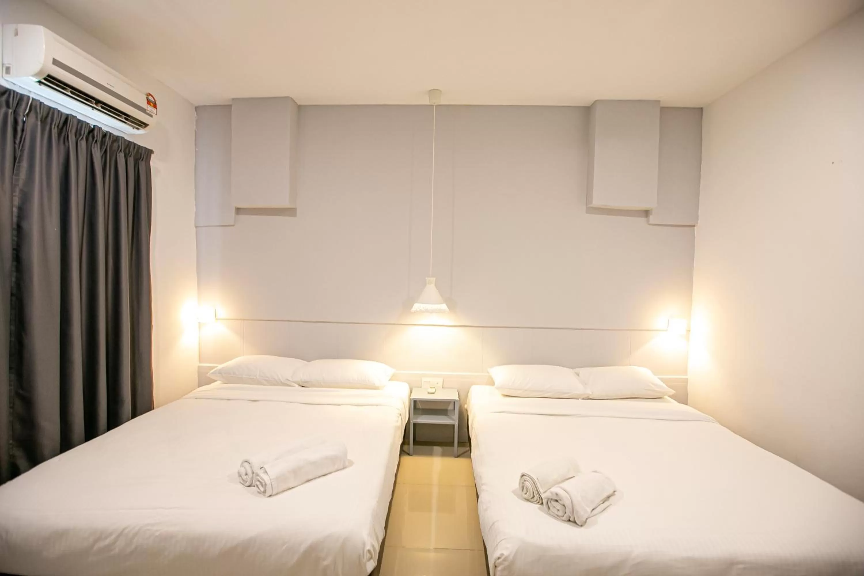 Bed in Grand Swiss Hotel