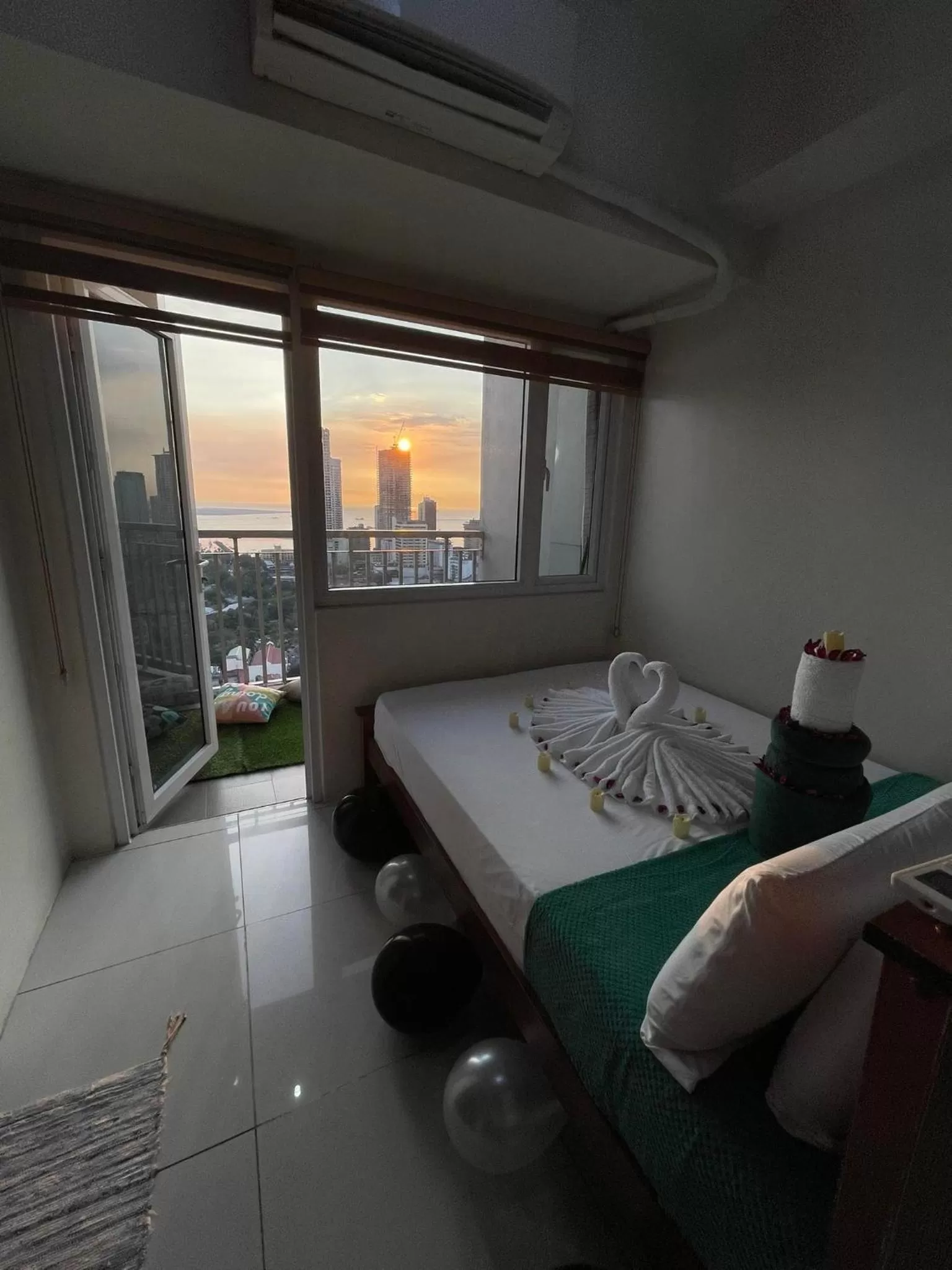 Bed in Green Residences Stays by PBYY