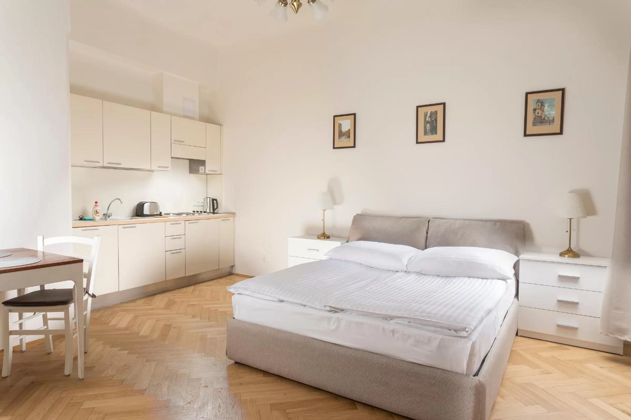 Bed in Three Golden Crowns Apartments