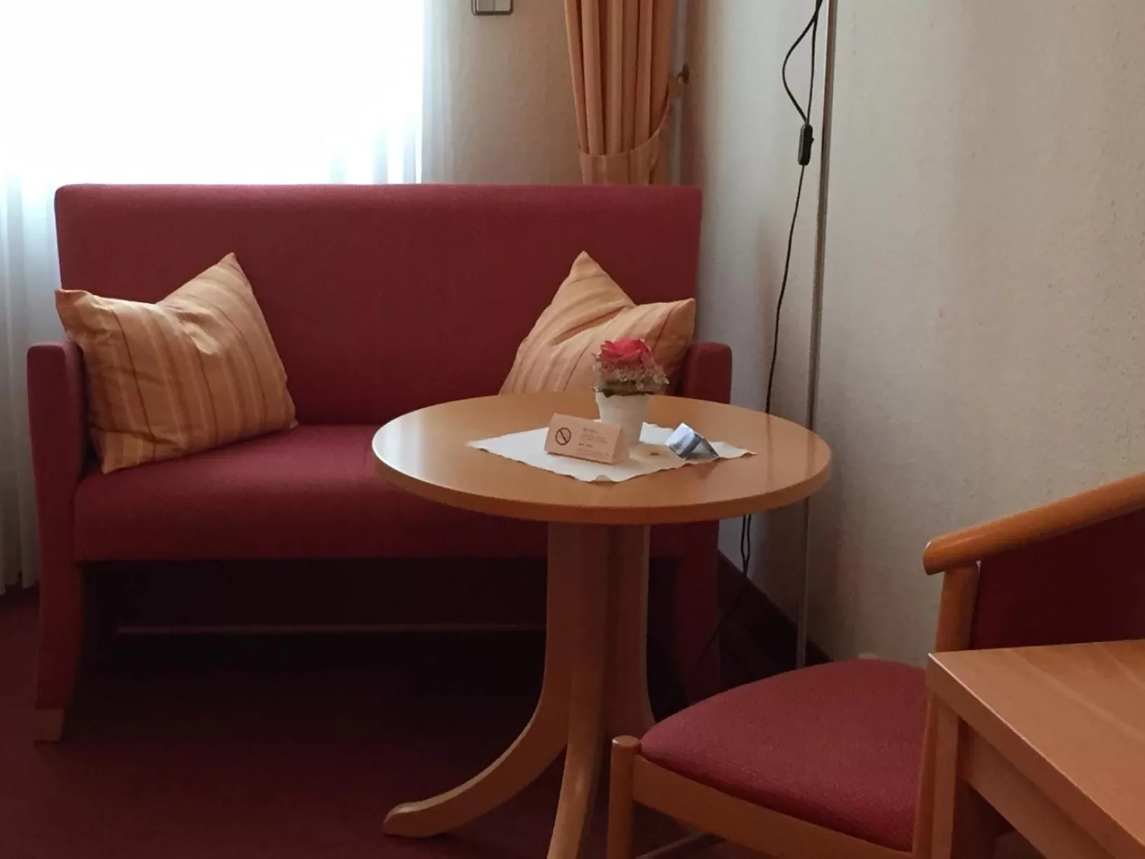 Seating area in Hotel Rose Heidelberg inklusive Frühstück, Saunanutzung und Parkplätze nach Verfügbarkeit