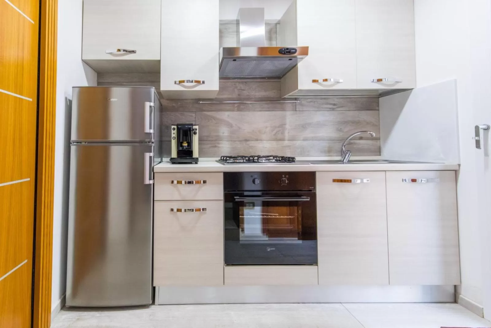 Communal kitchen in B&b Il miglio d’oro