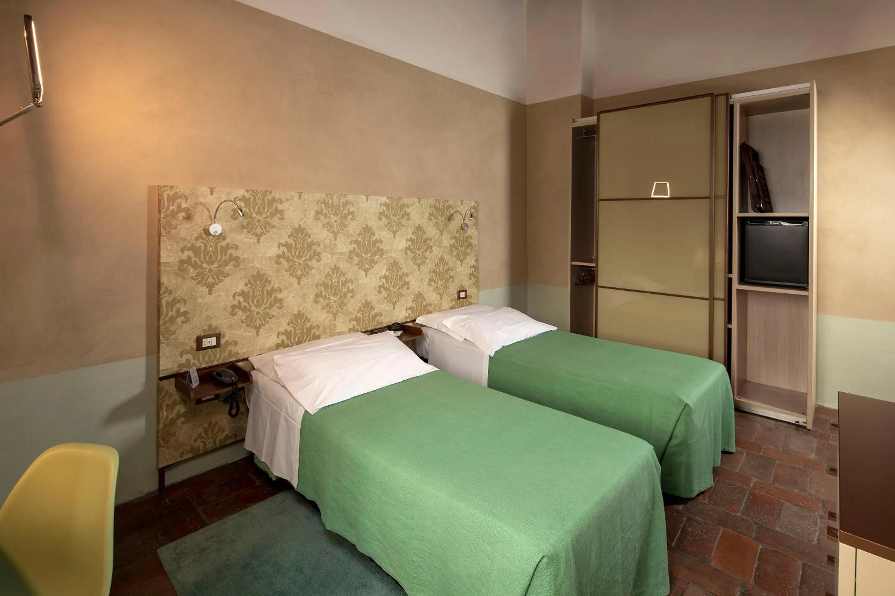 Bed in Hotel Le Capanne