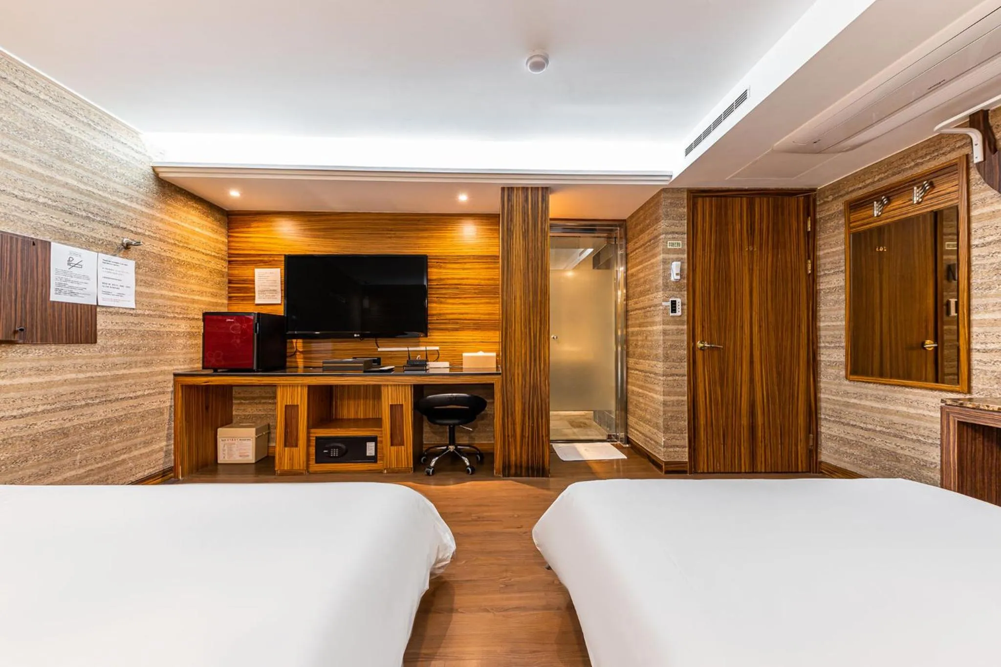 Bed in Friendly DH Naissance Hotel by Mindrum Group