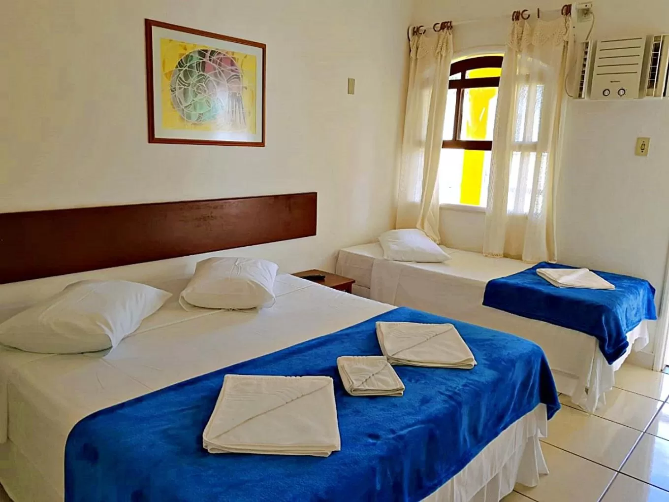 Bed in Pousada Estrela de Paraty