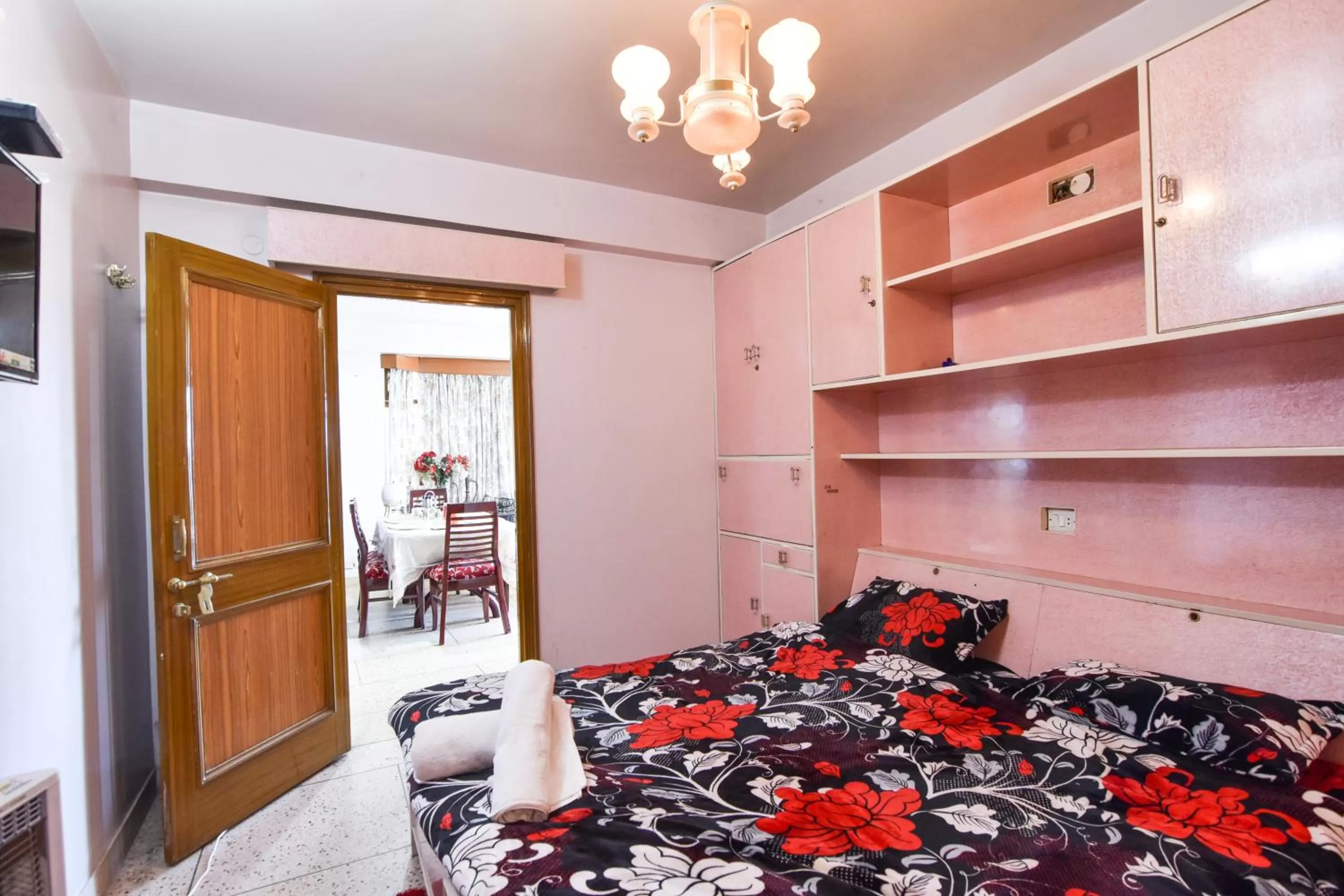 Bedroom in Dhanlaxmi Apartments