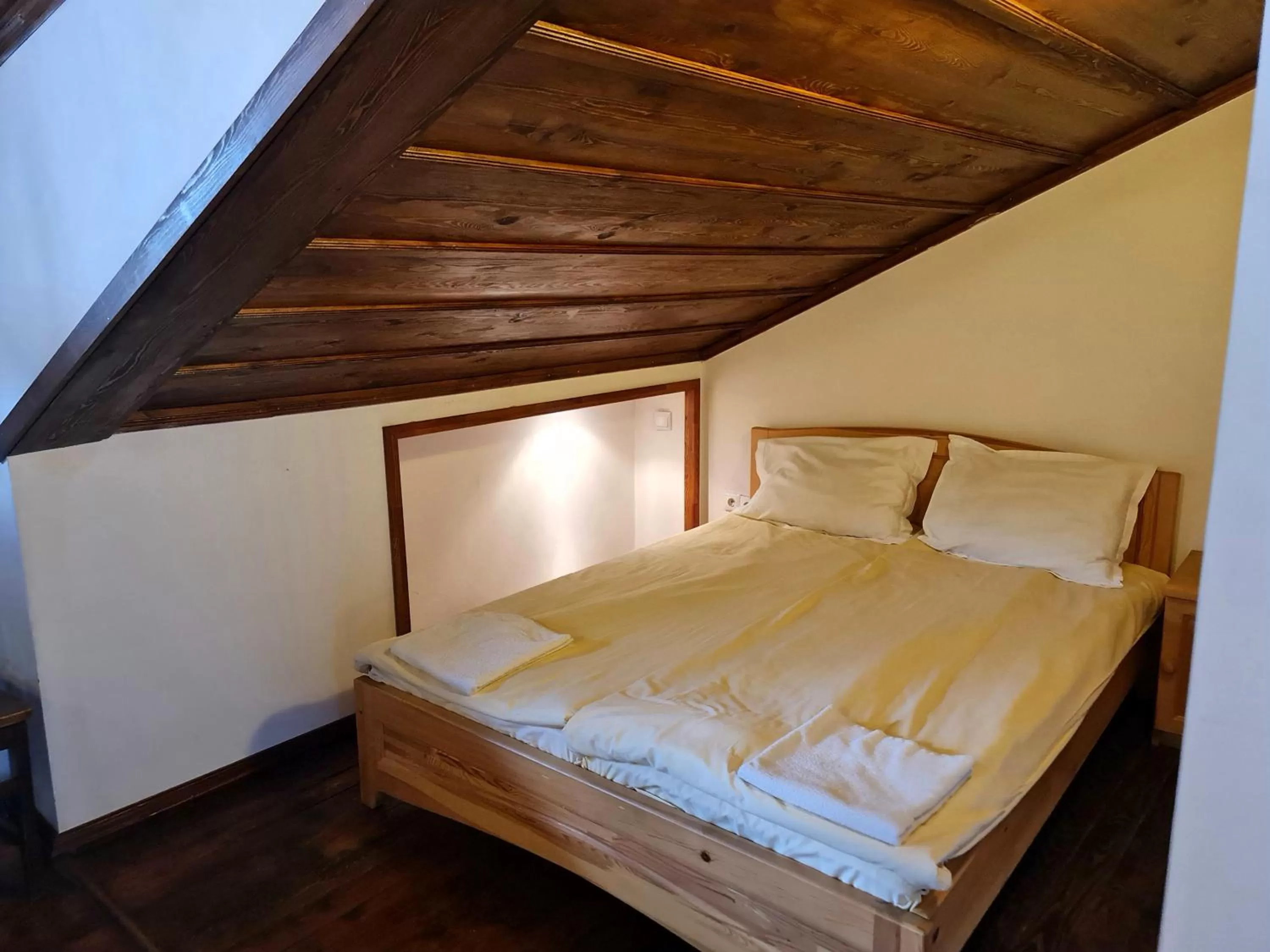 Bed in The Old House Family Hotel