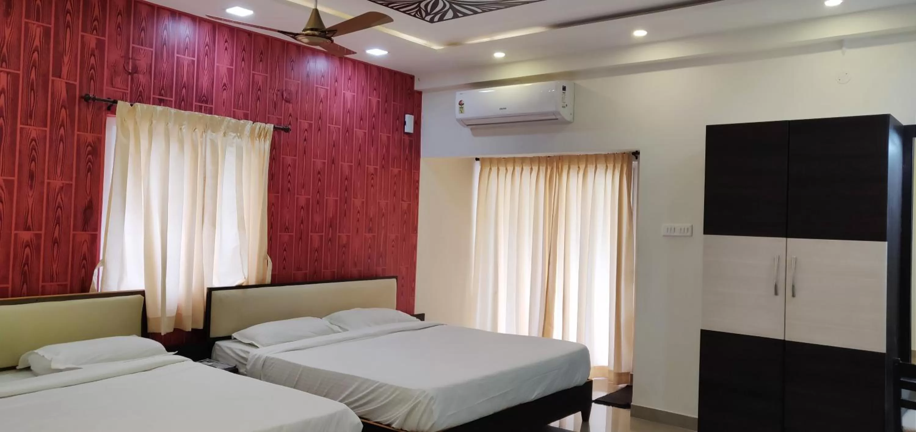 Bed in Hotel Ambai Grand