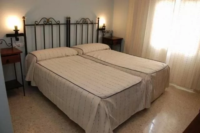 Bed in Hotel Don Juan