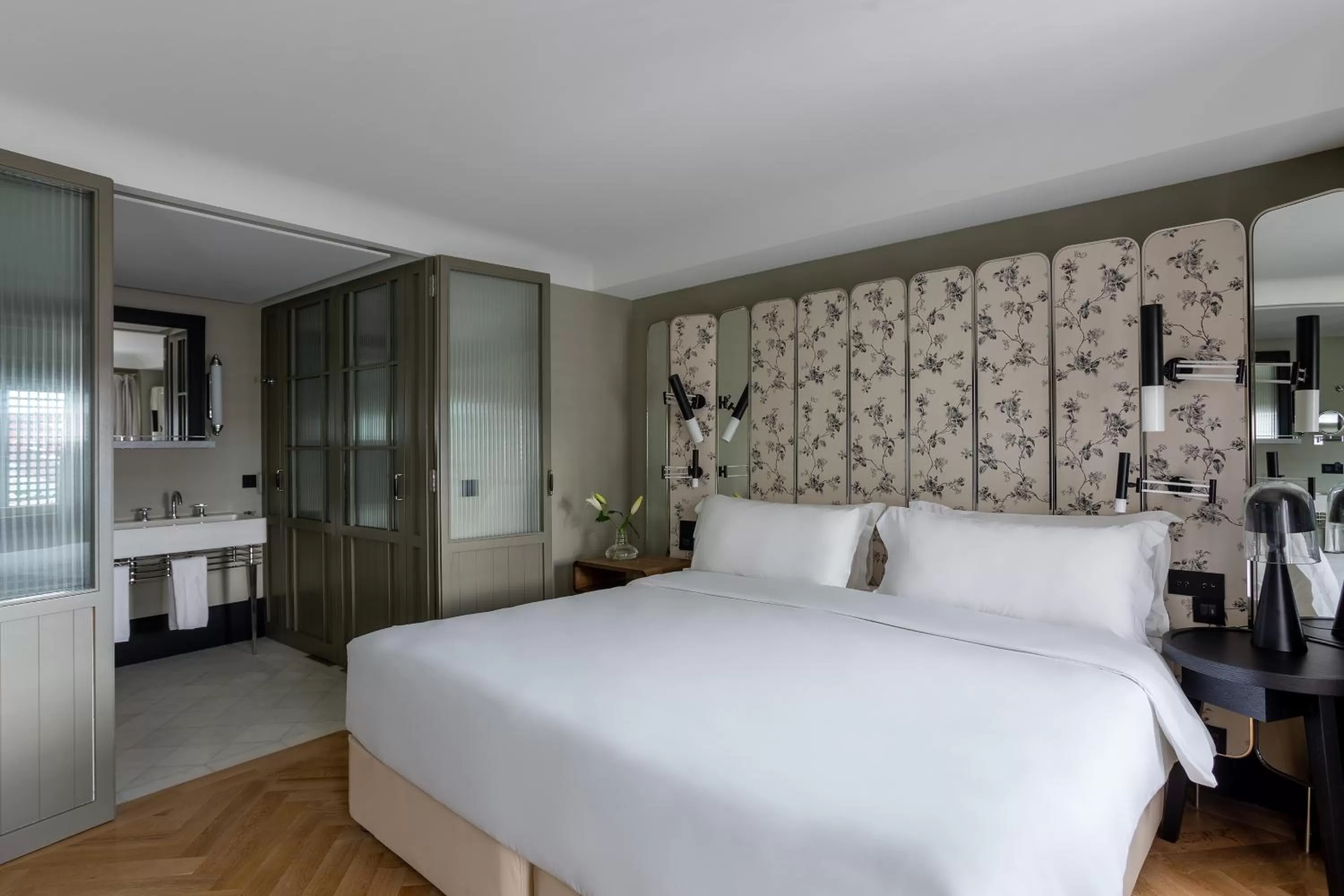 Bed in The Wings Hotels Collection