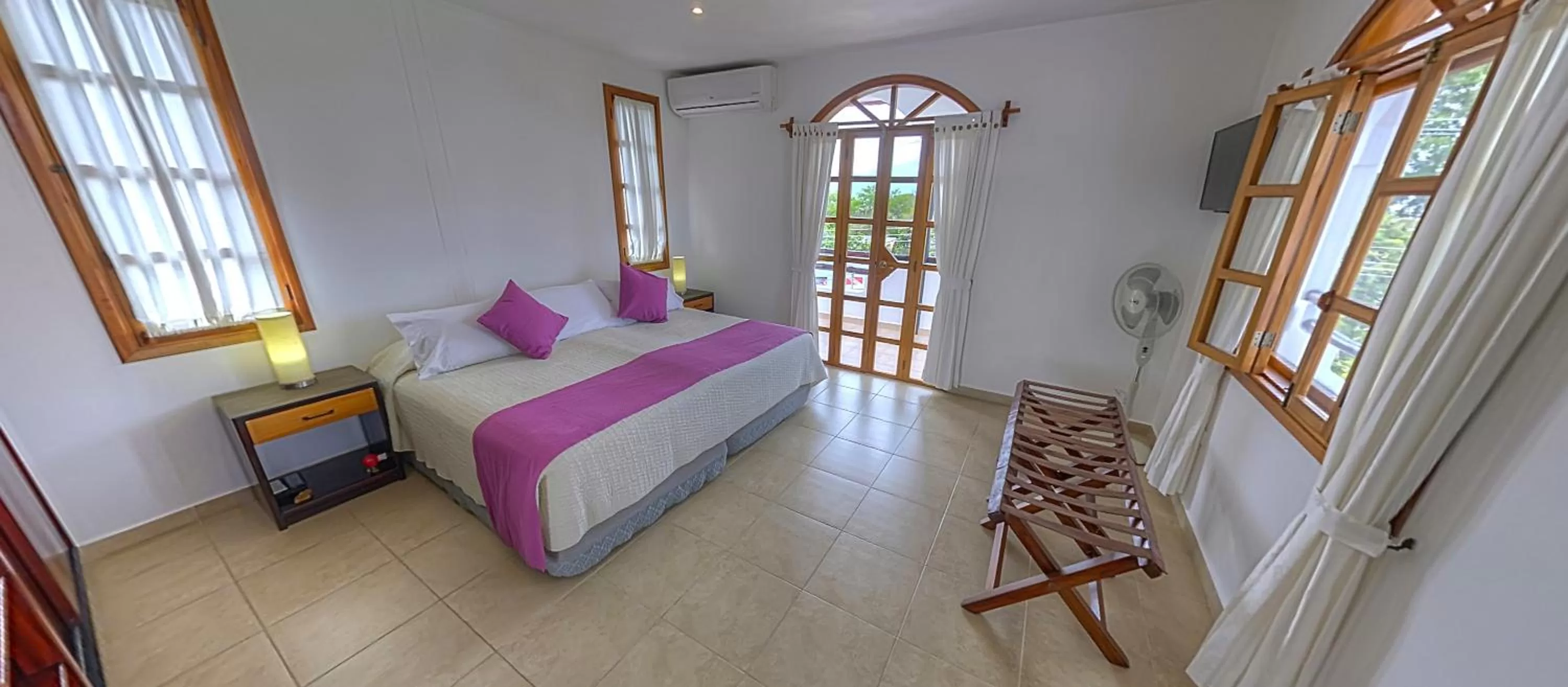 Bedroom, Bed in Hotel Galapagos Suites B&B