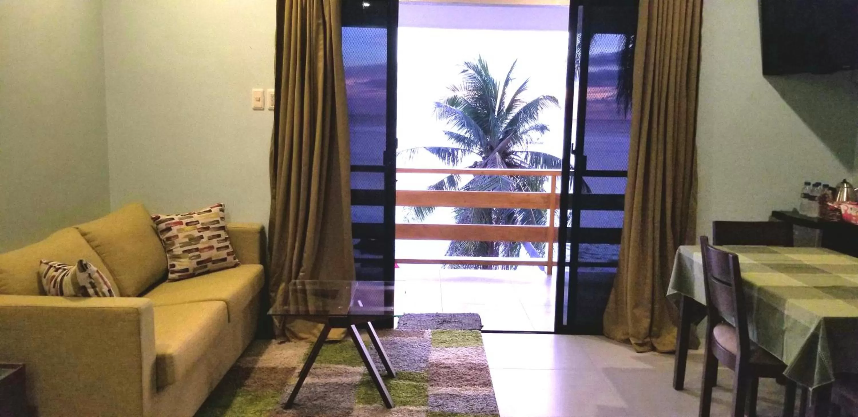 Seating area in Tropical Fun Ta Sea Rentals