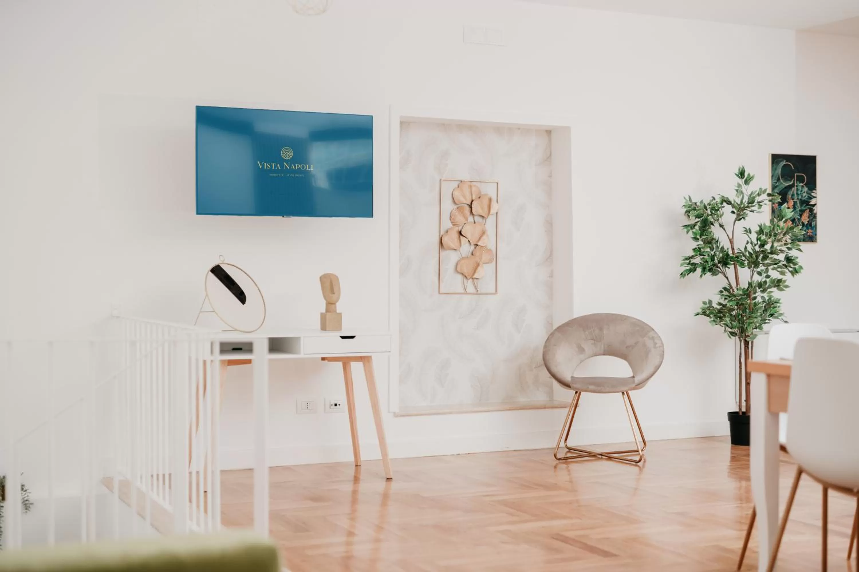 TV and multimedia in Vista Napoli Residence by Casa Napoletana