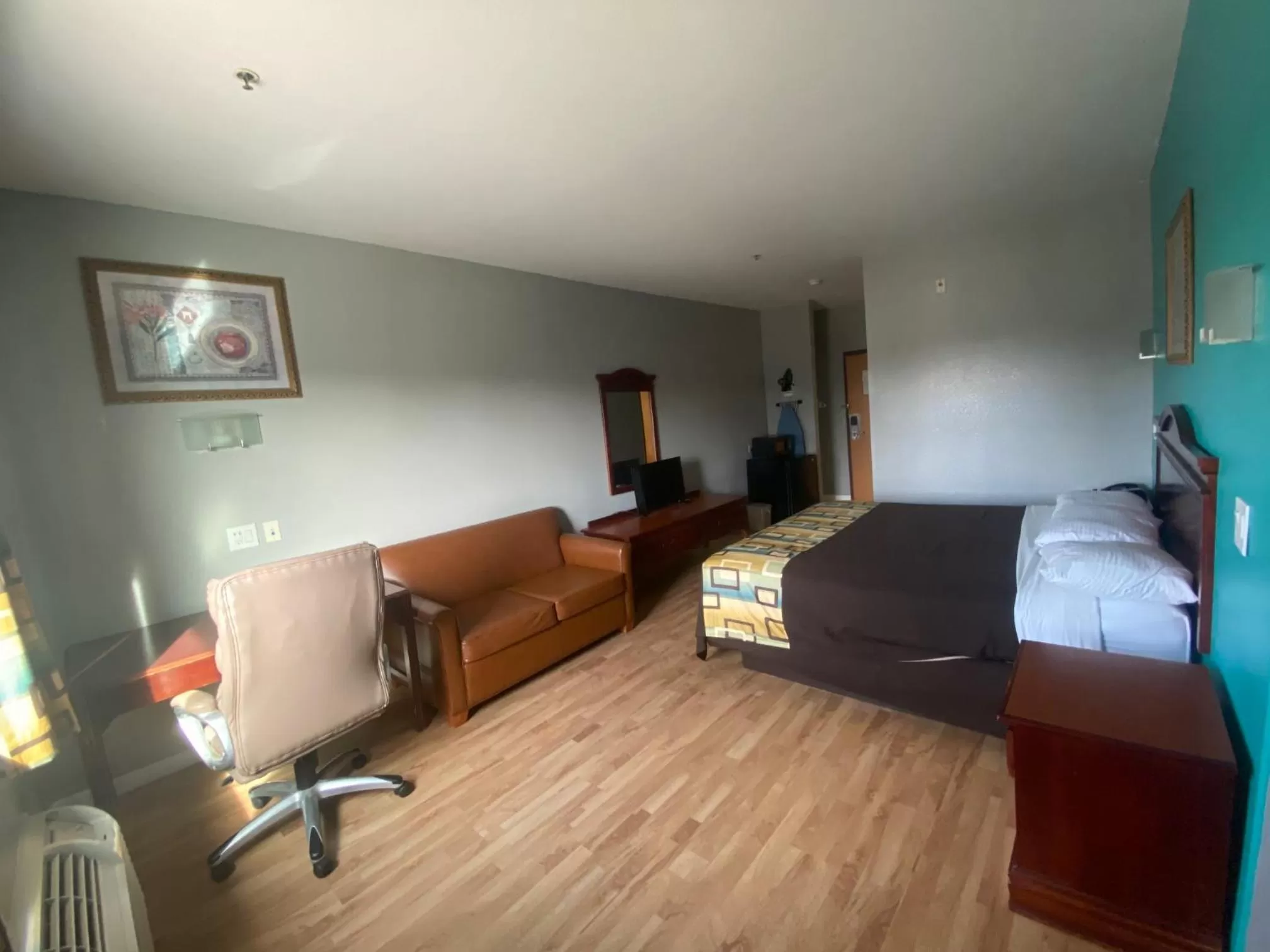 Bed in Tropicana Inn and Suites