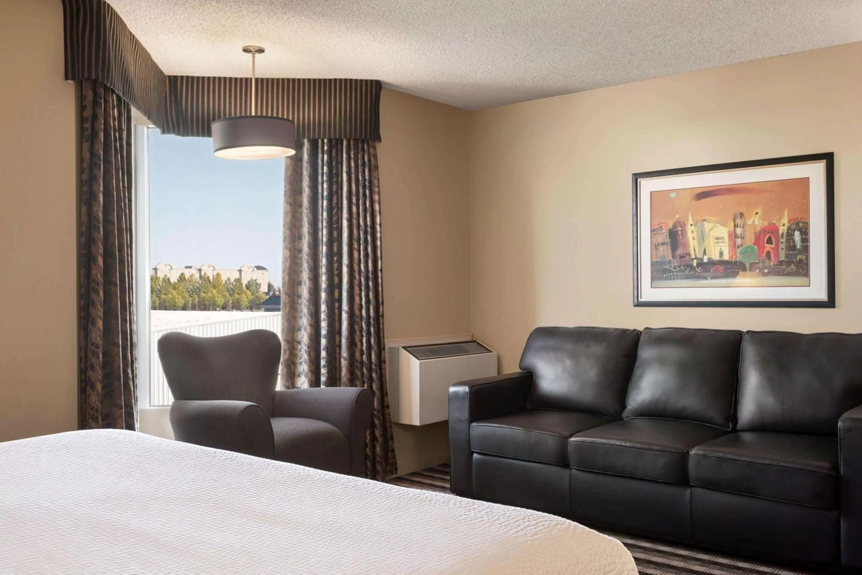 Photo of the whole room, Bed in Royal Hotel West Edmonton, Trademark Collection by Wyndham