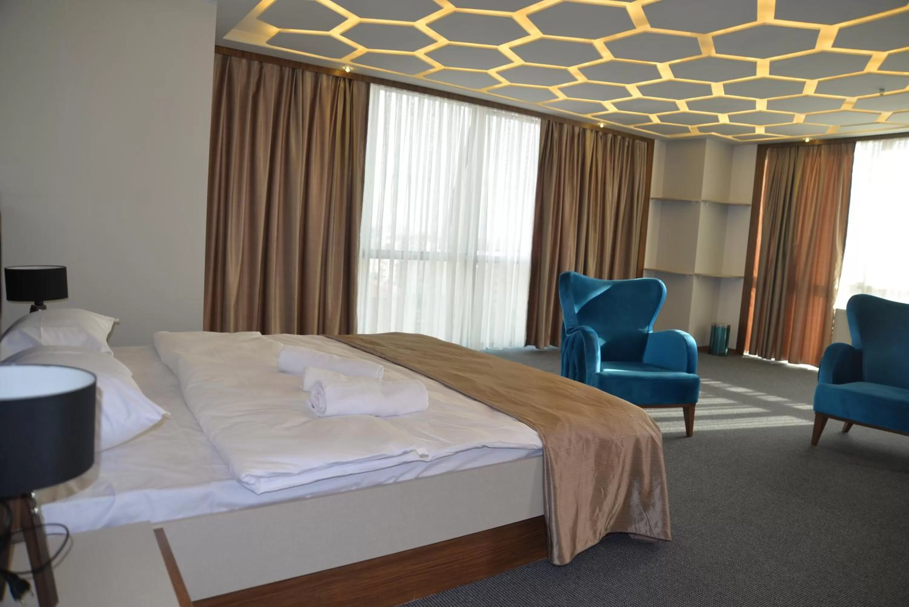 Bed in TEVETOGLU HOTEL