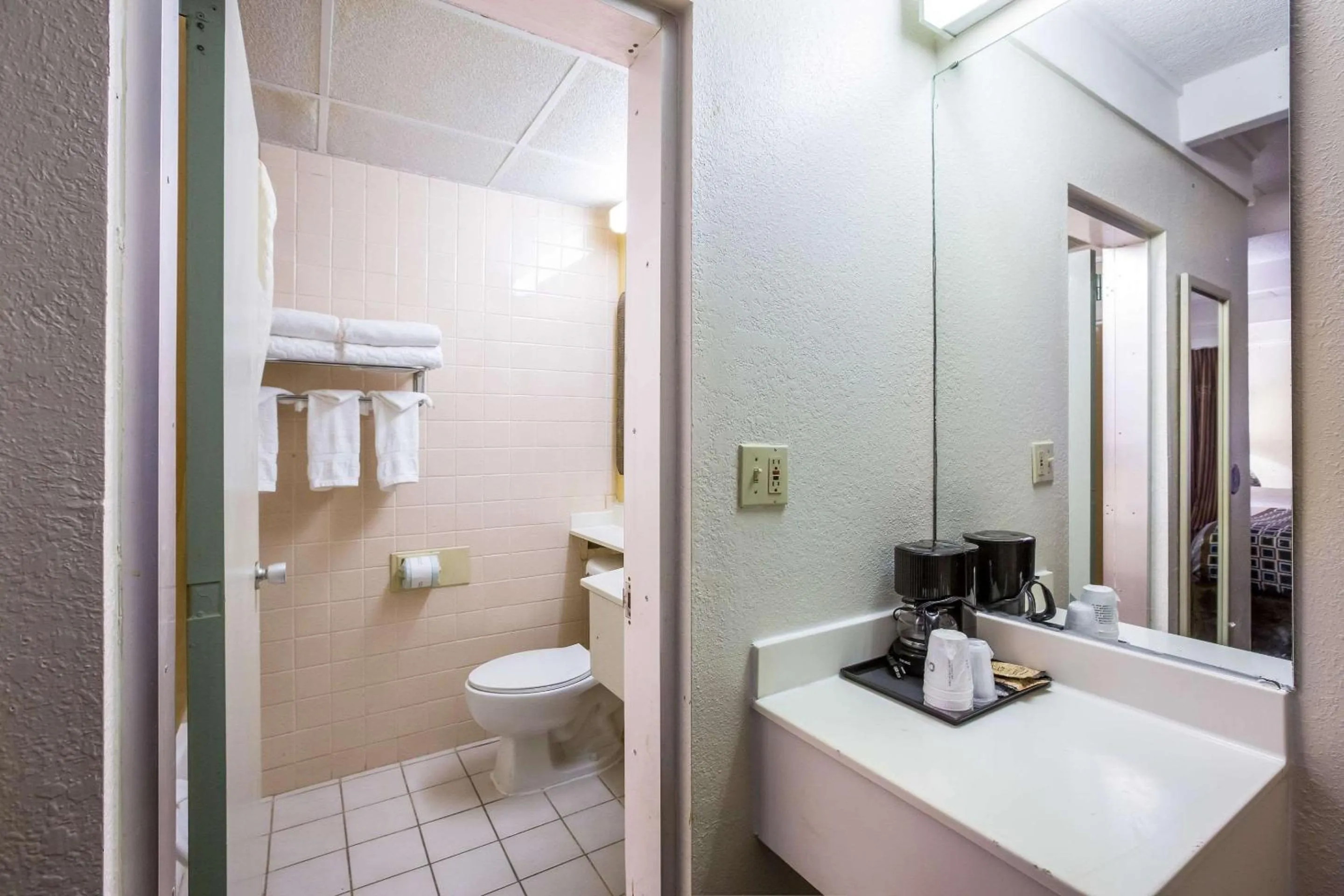 Bathroom in Super 8 by Wyndham Macon GA