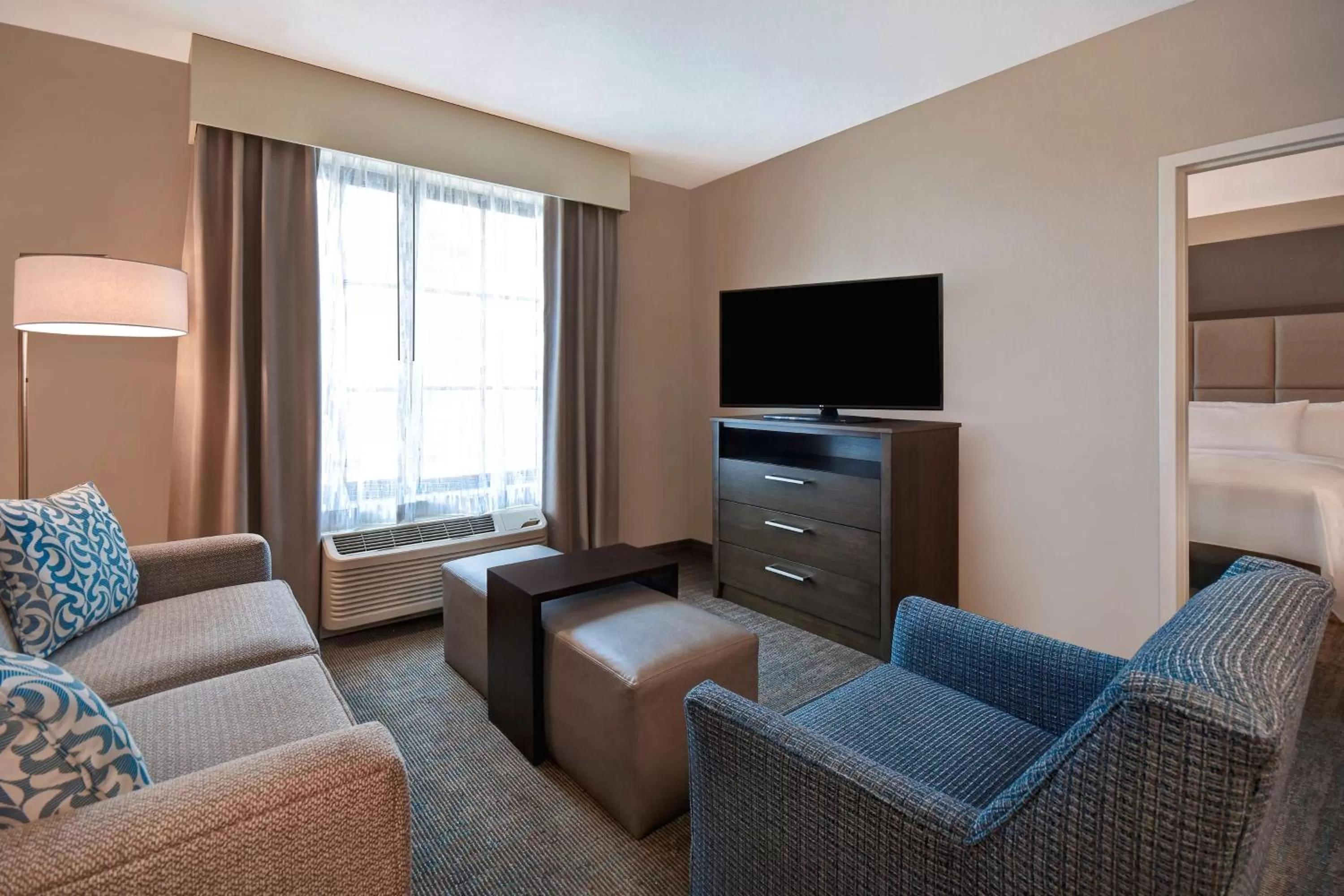 Living room in Homewood Suites By Hilton Orlando Flamingo Crossings, Fl