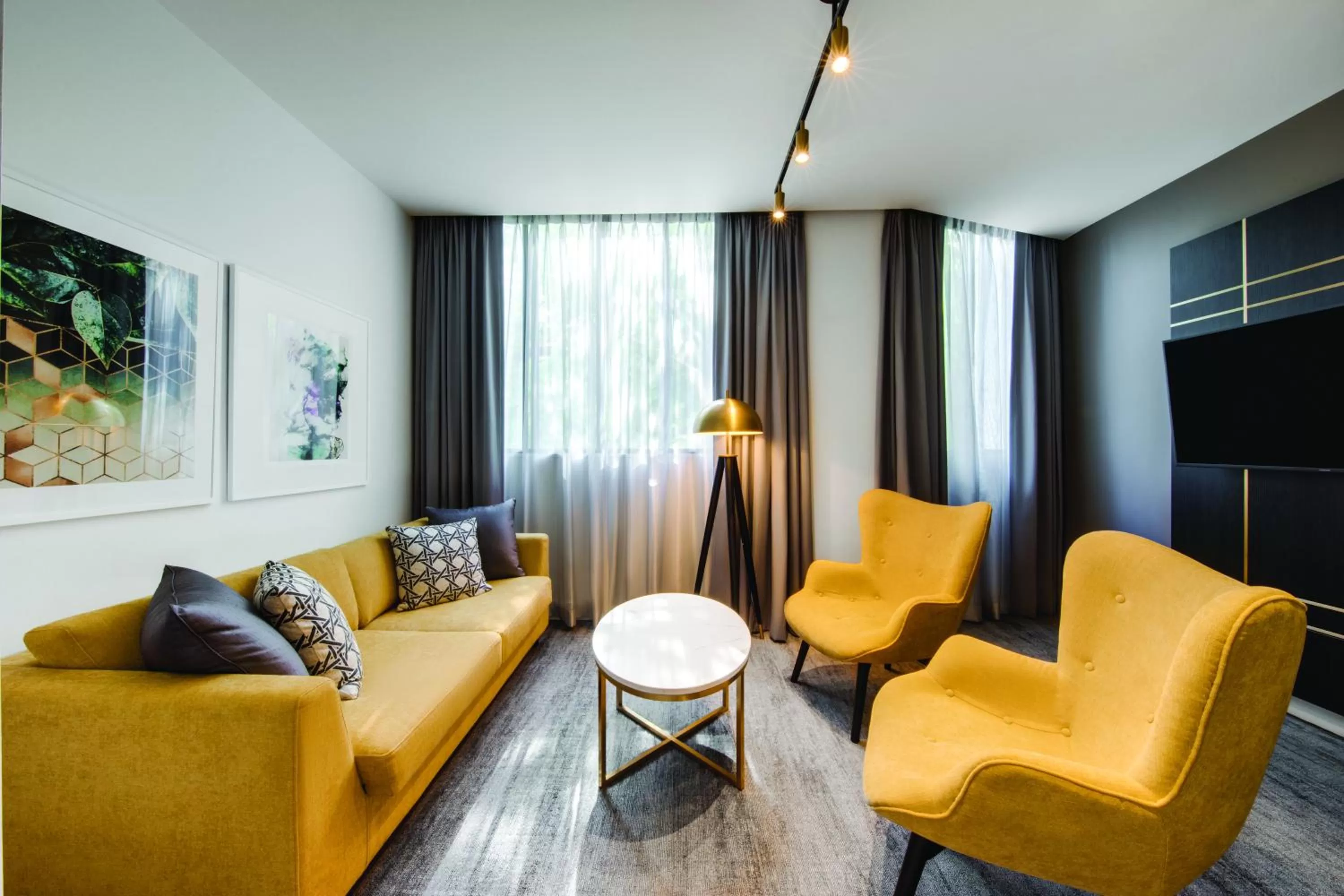 Living room in Vibe Hotel Sydney