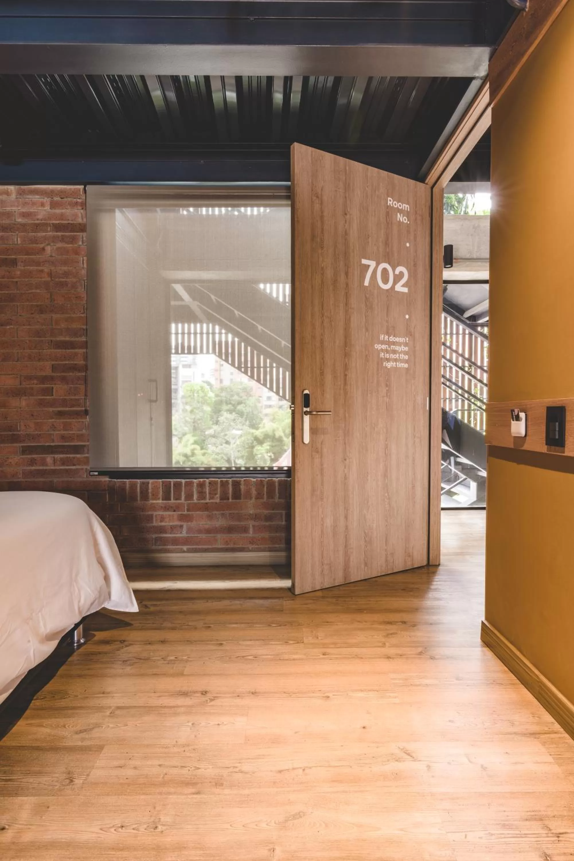 Facade/entrance, Bed in The Somos Beats Hotel & Rooftop