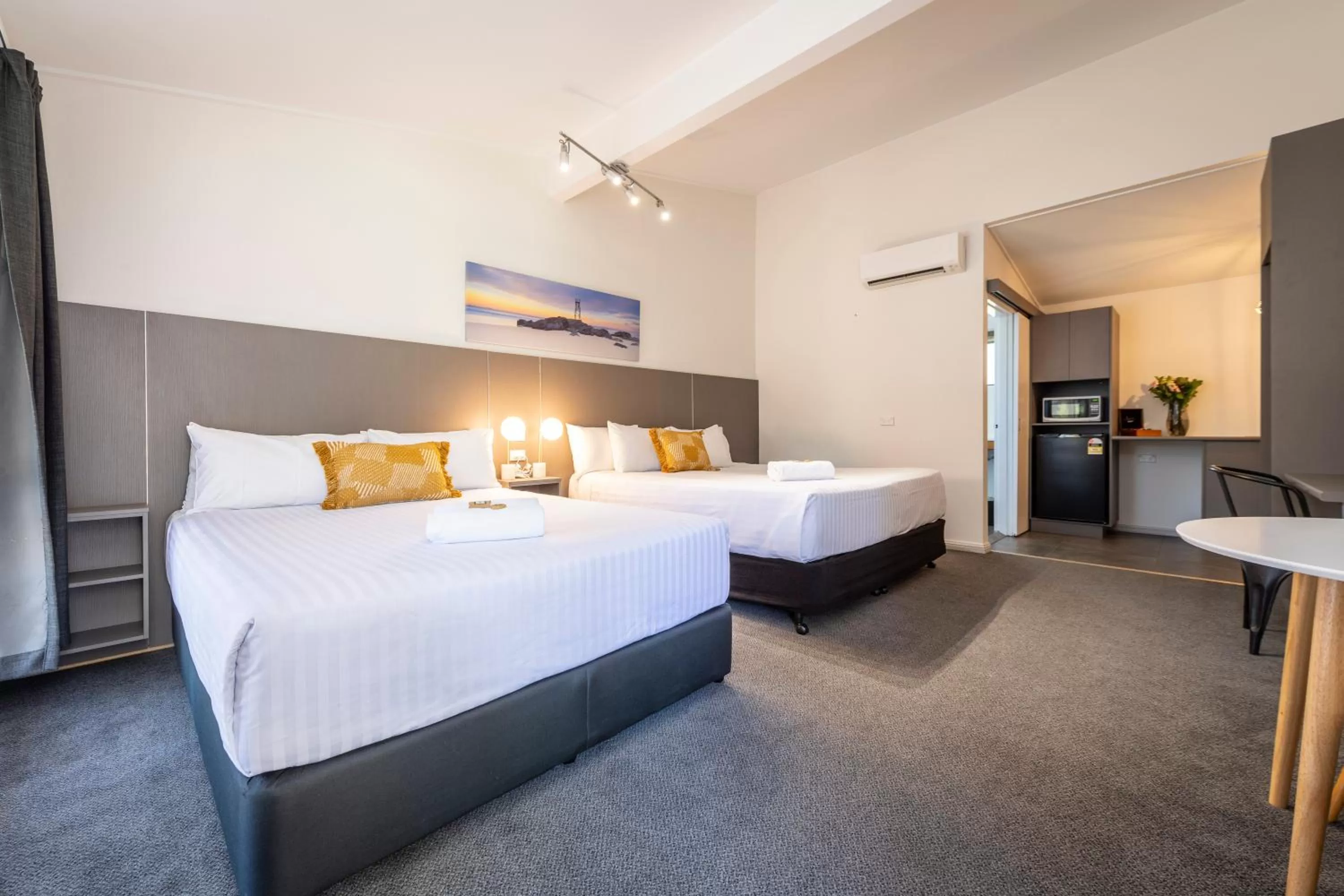 Bed in Fern Bay Motel