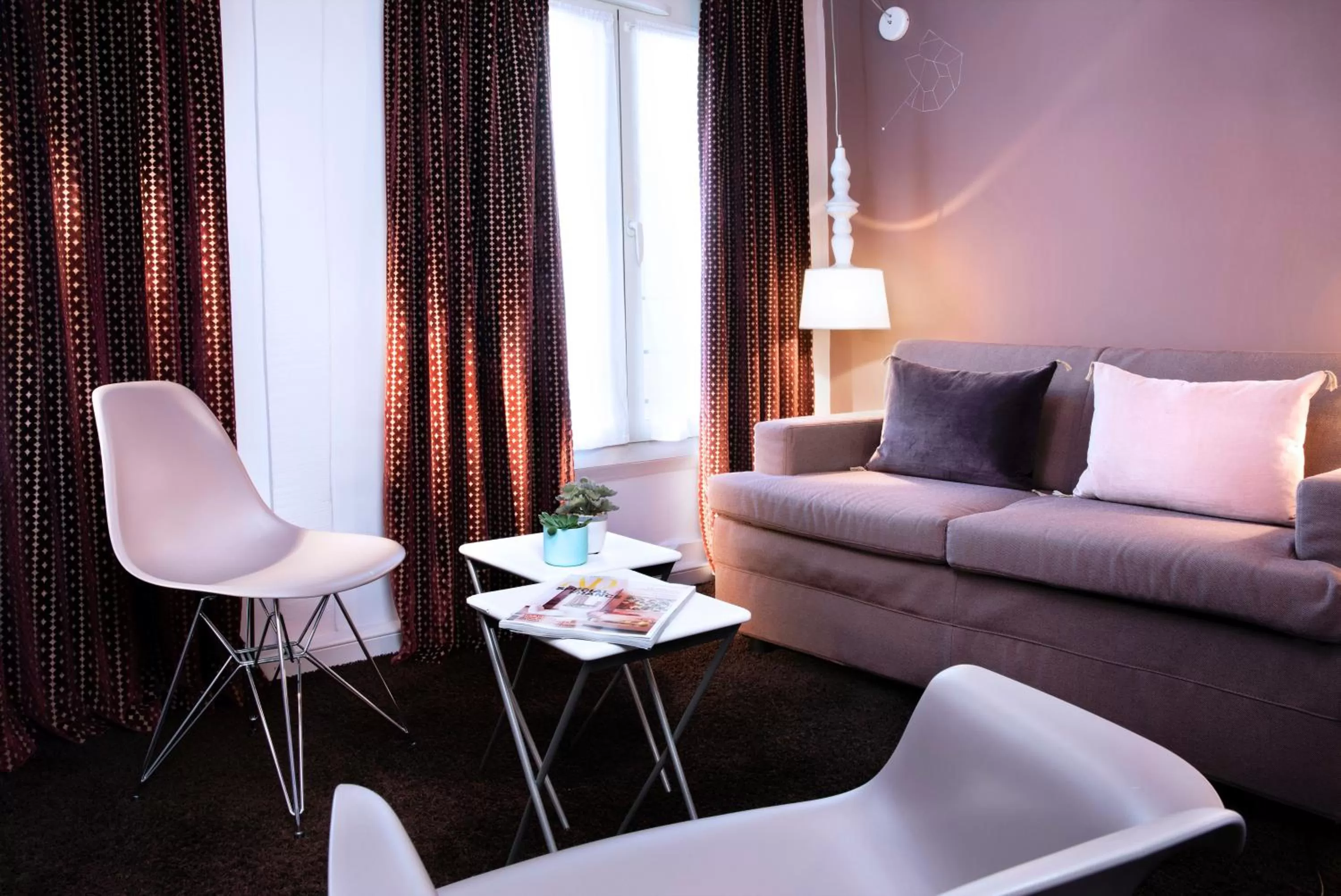 Living room in Hôtel Marais Hôme