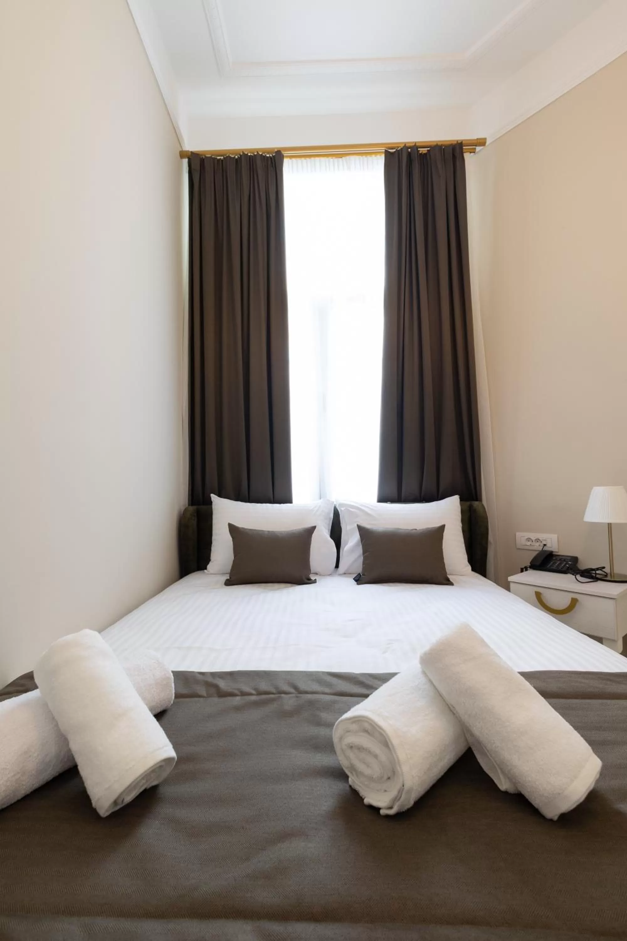 Bed in Modern Revival Luxury Hotel