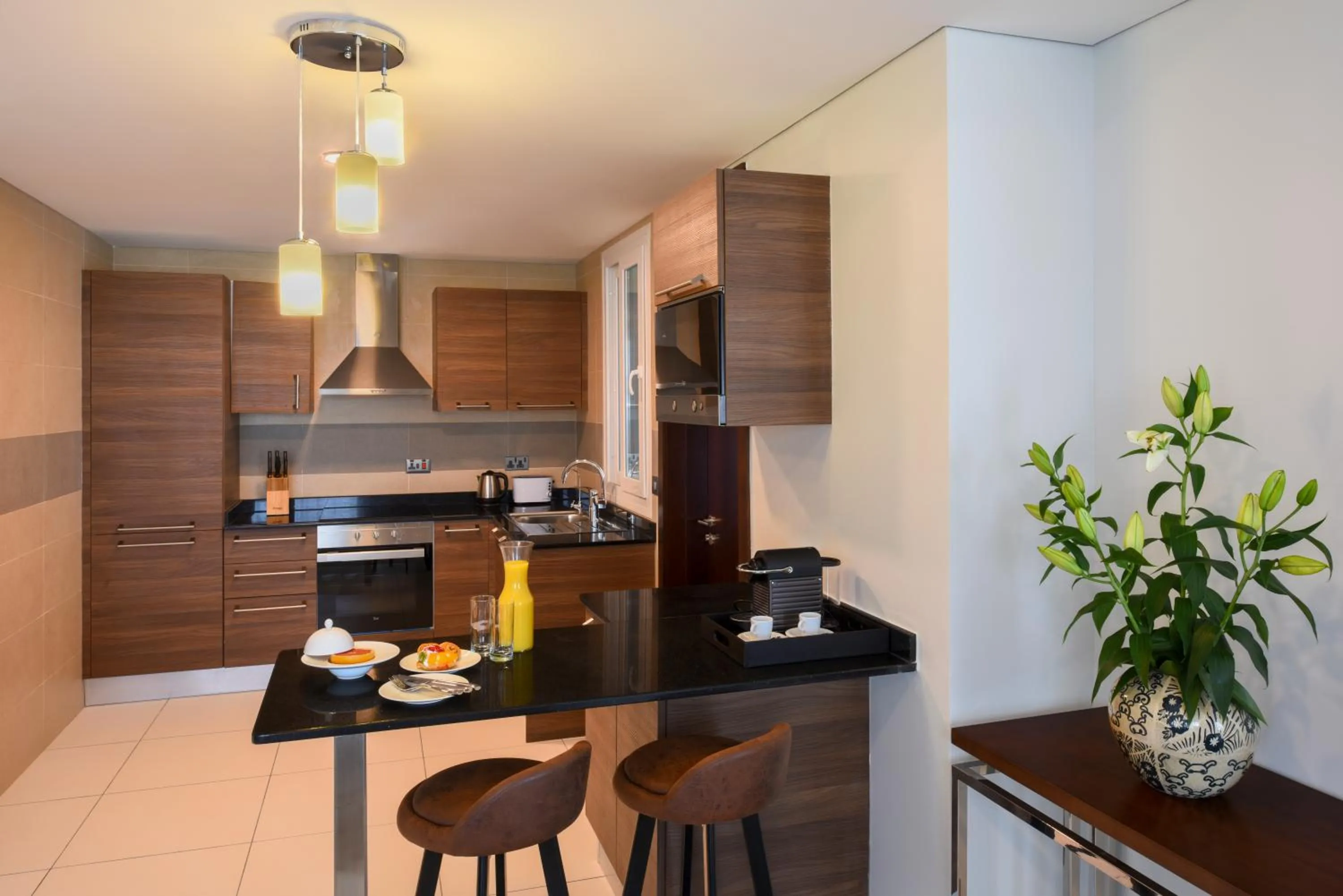 Kitchen or kitchenette in Fraser Suites Muscat