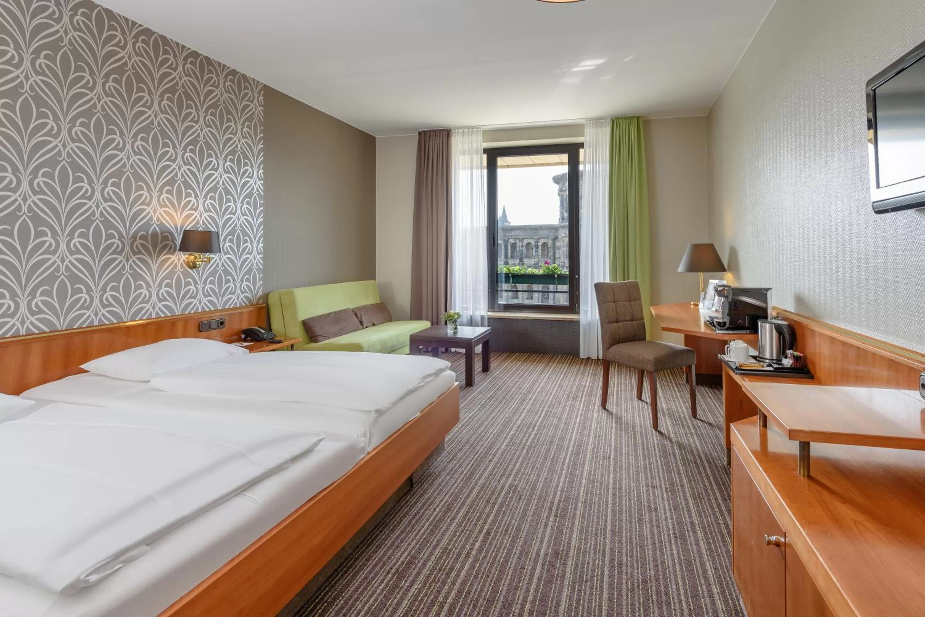 Photo of the whole room, Bed in Mercure Hotel Trier Porta Nigra