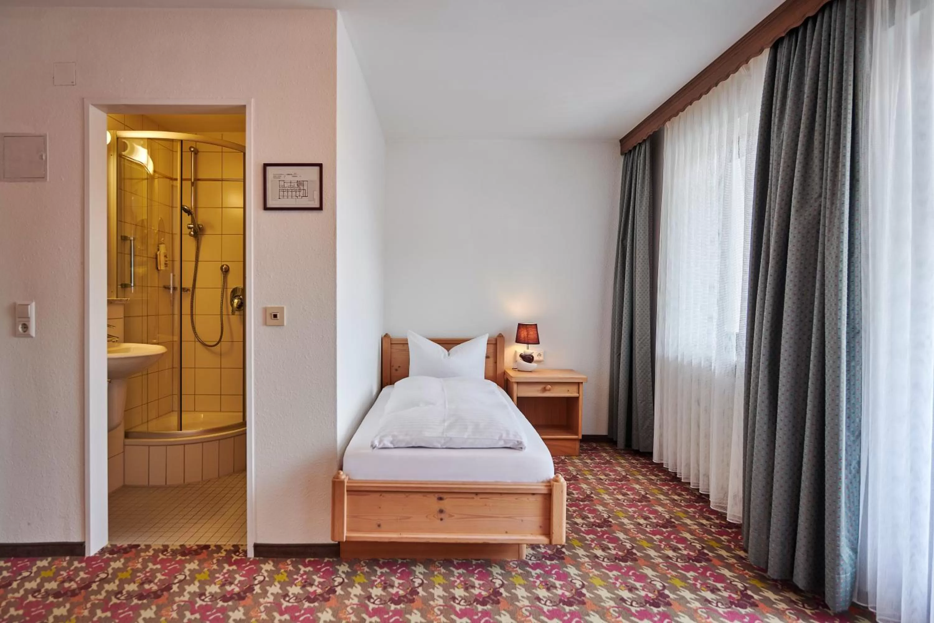 Photo of the whole room, Bed in Hotel Bannwaldsee