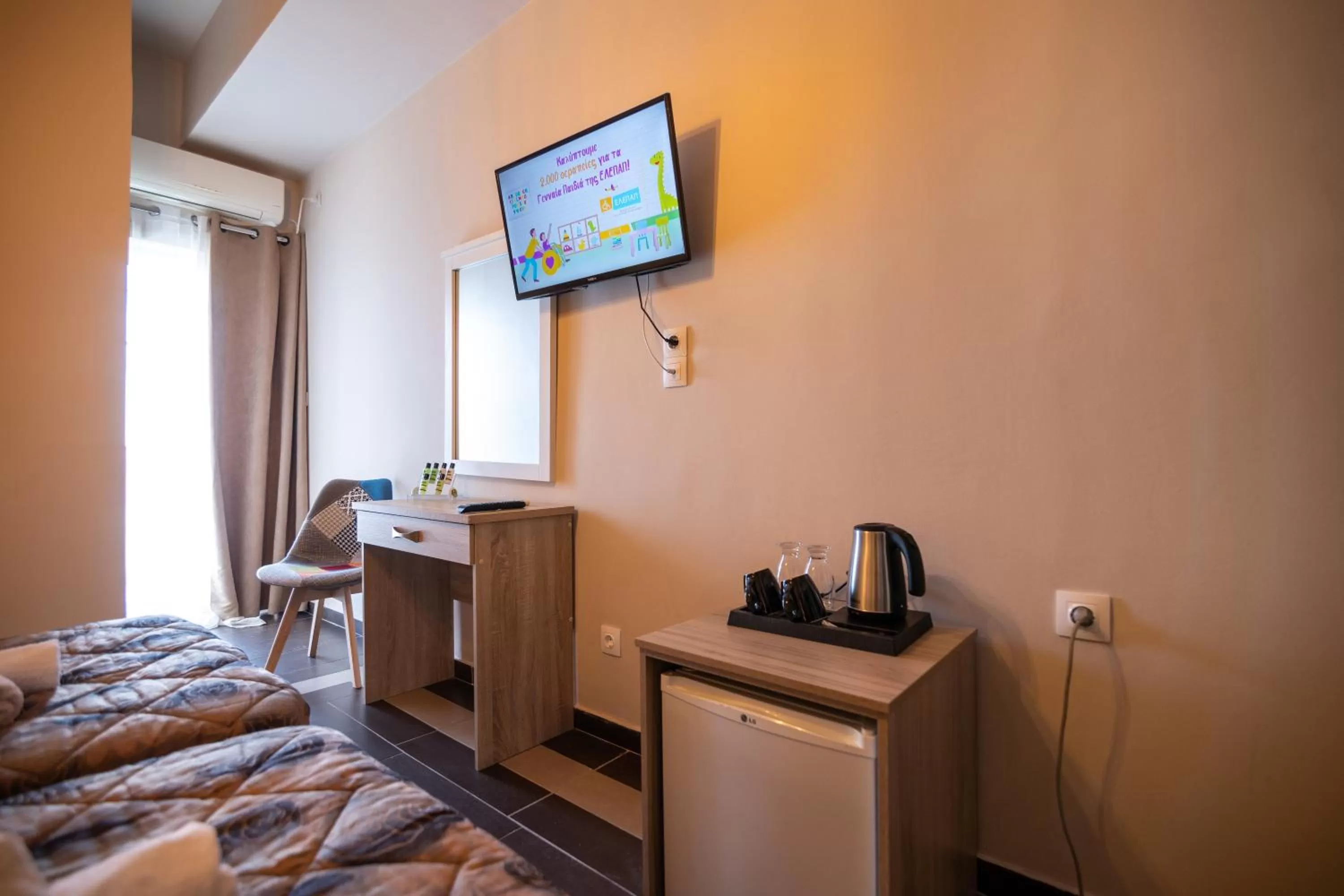 Bed in Votsalakia Hotel & Luxury Apartments