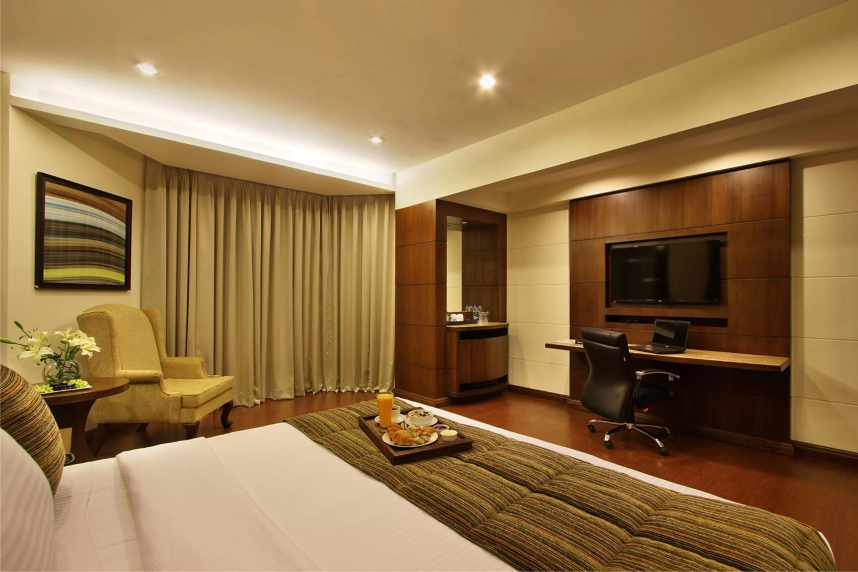Photo of the whole room, Bed in Hotel Express Residency Vadodara
