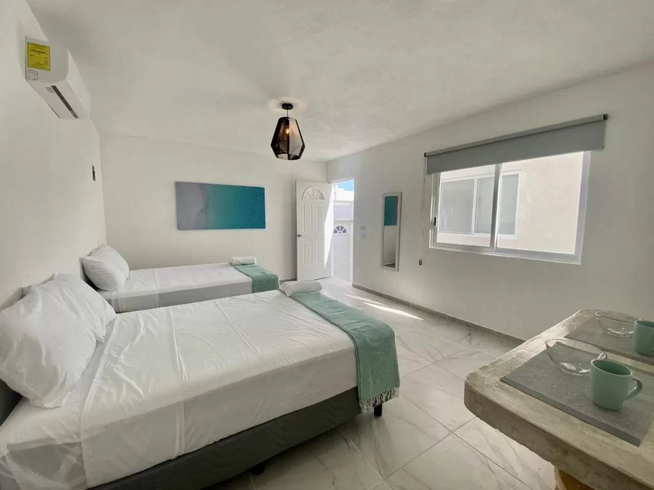 Bed in Casa Colibrí El Cuyo