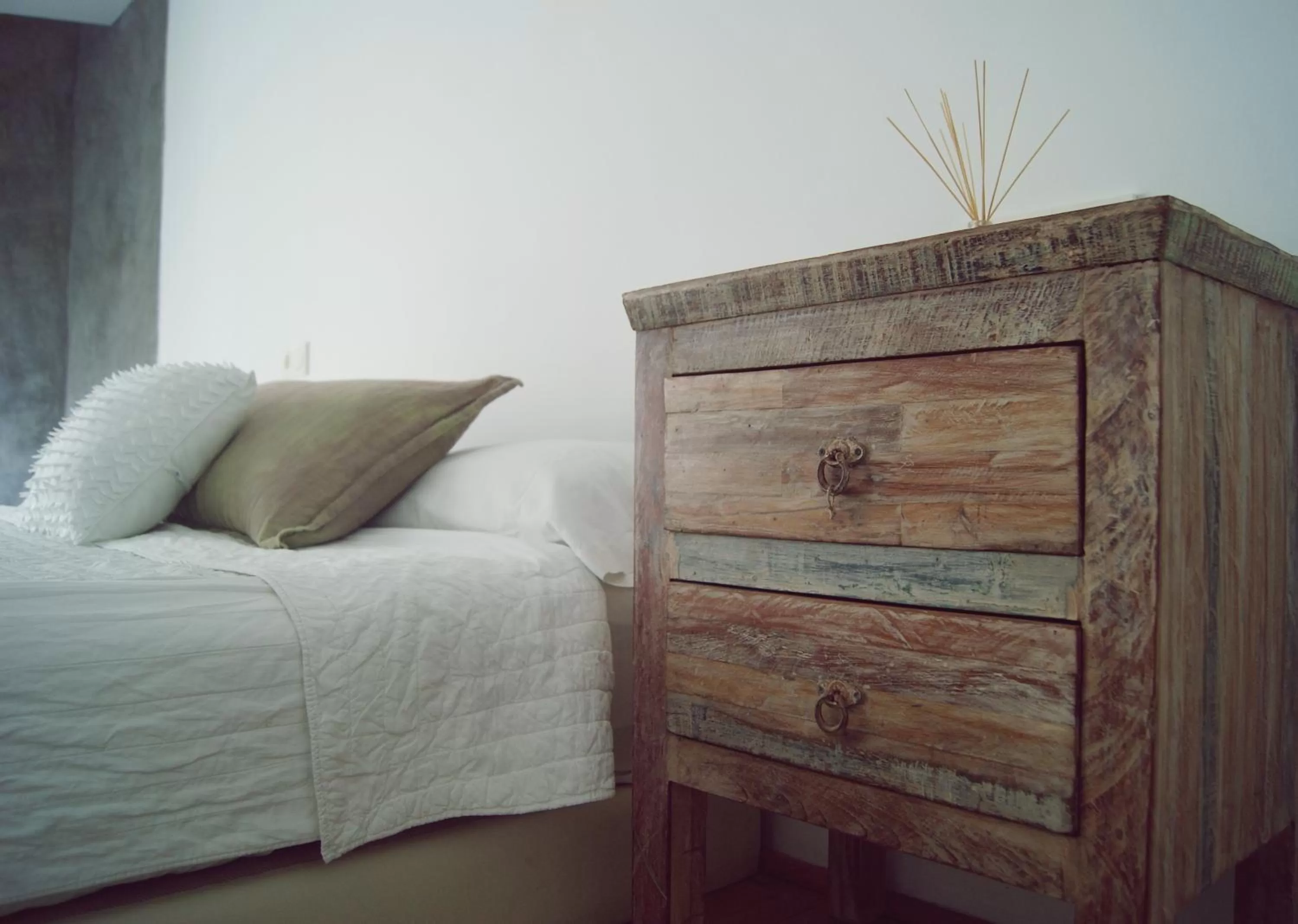 Bed in La Maga Rooms