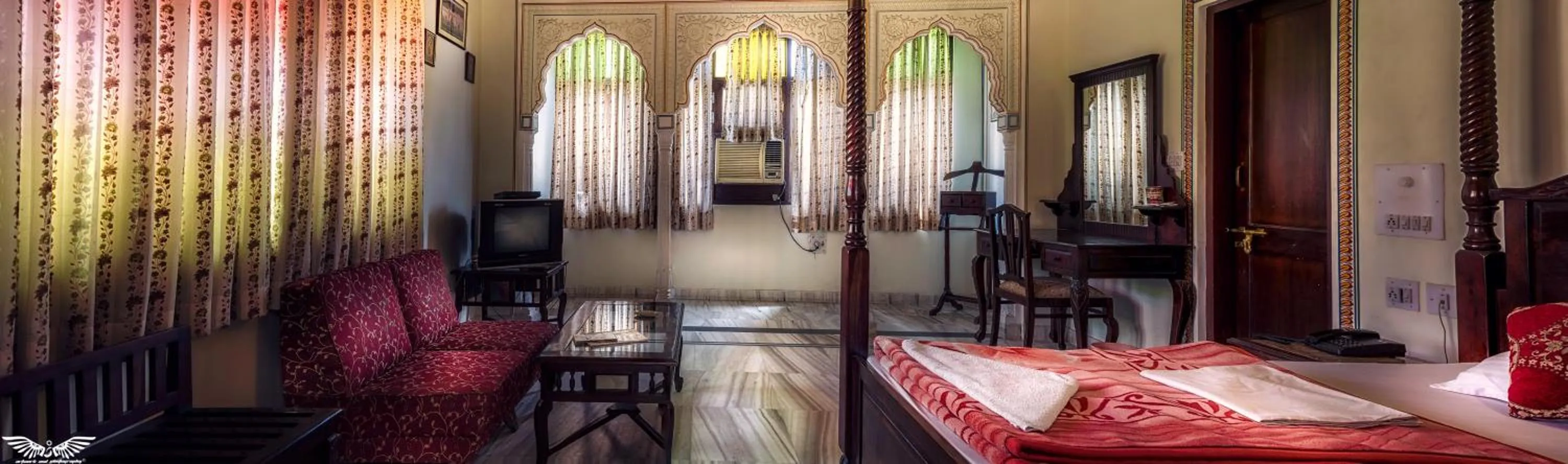 Bed in Krishna Palace - A Heritage Boutique Hotel