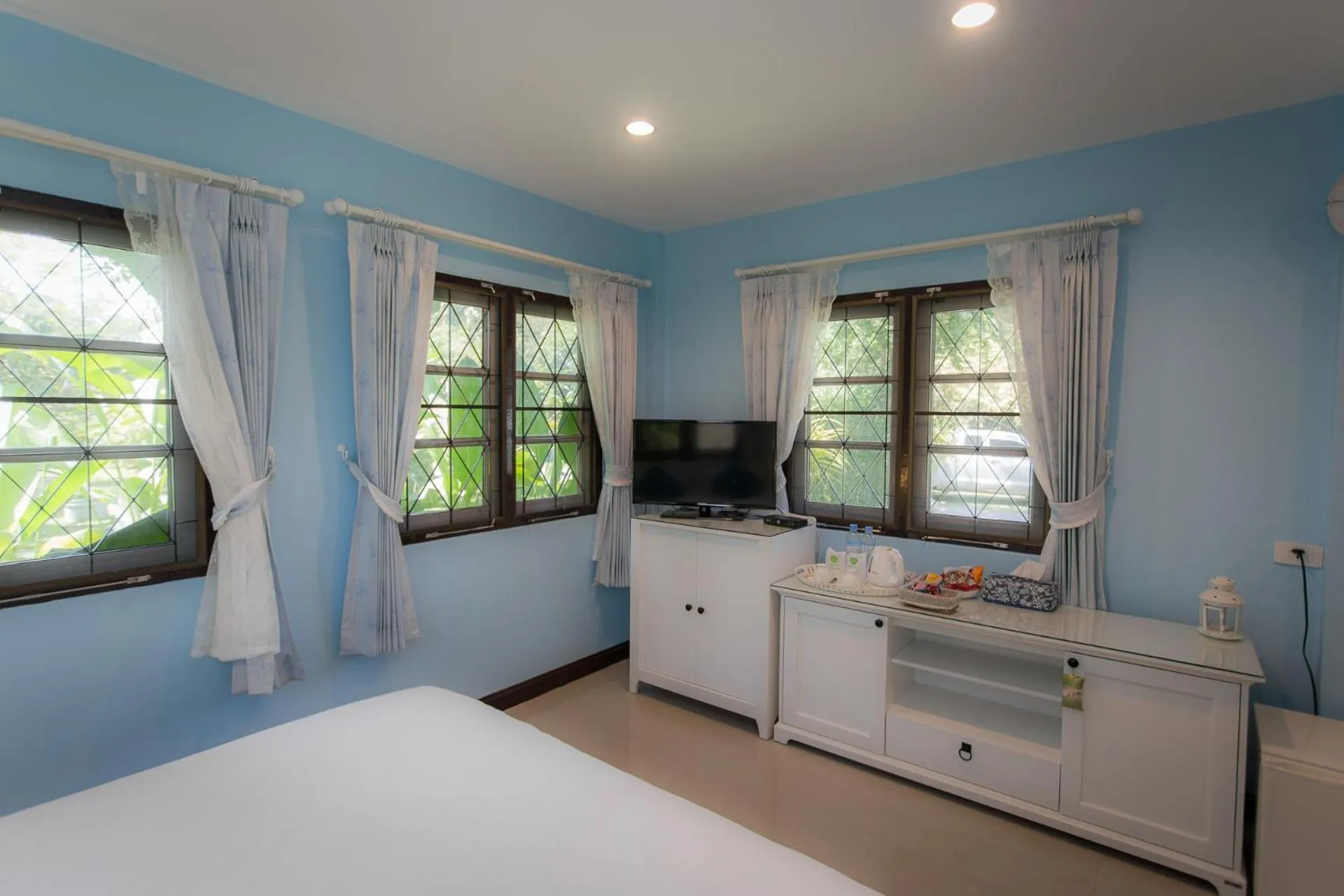 Bed in Thararin Villa