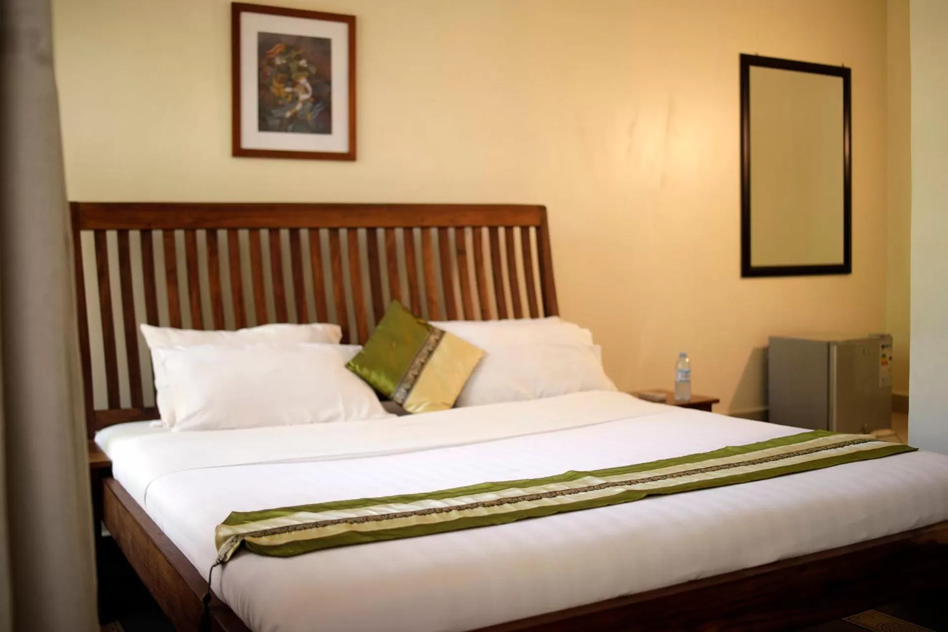 Bed in Entebbe Palm Hotel