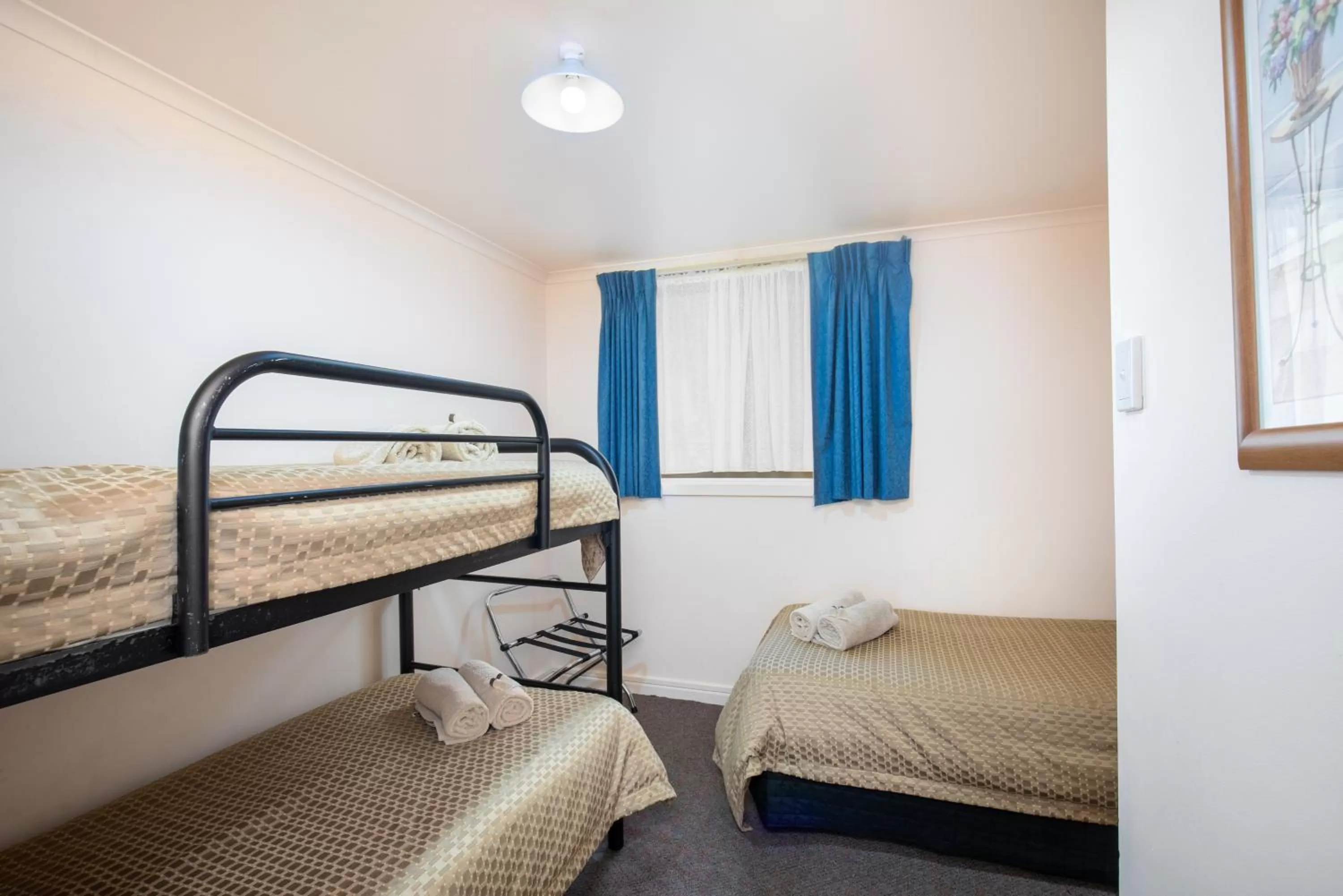 Bed in Mid City Motel