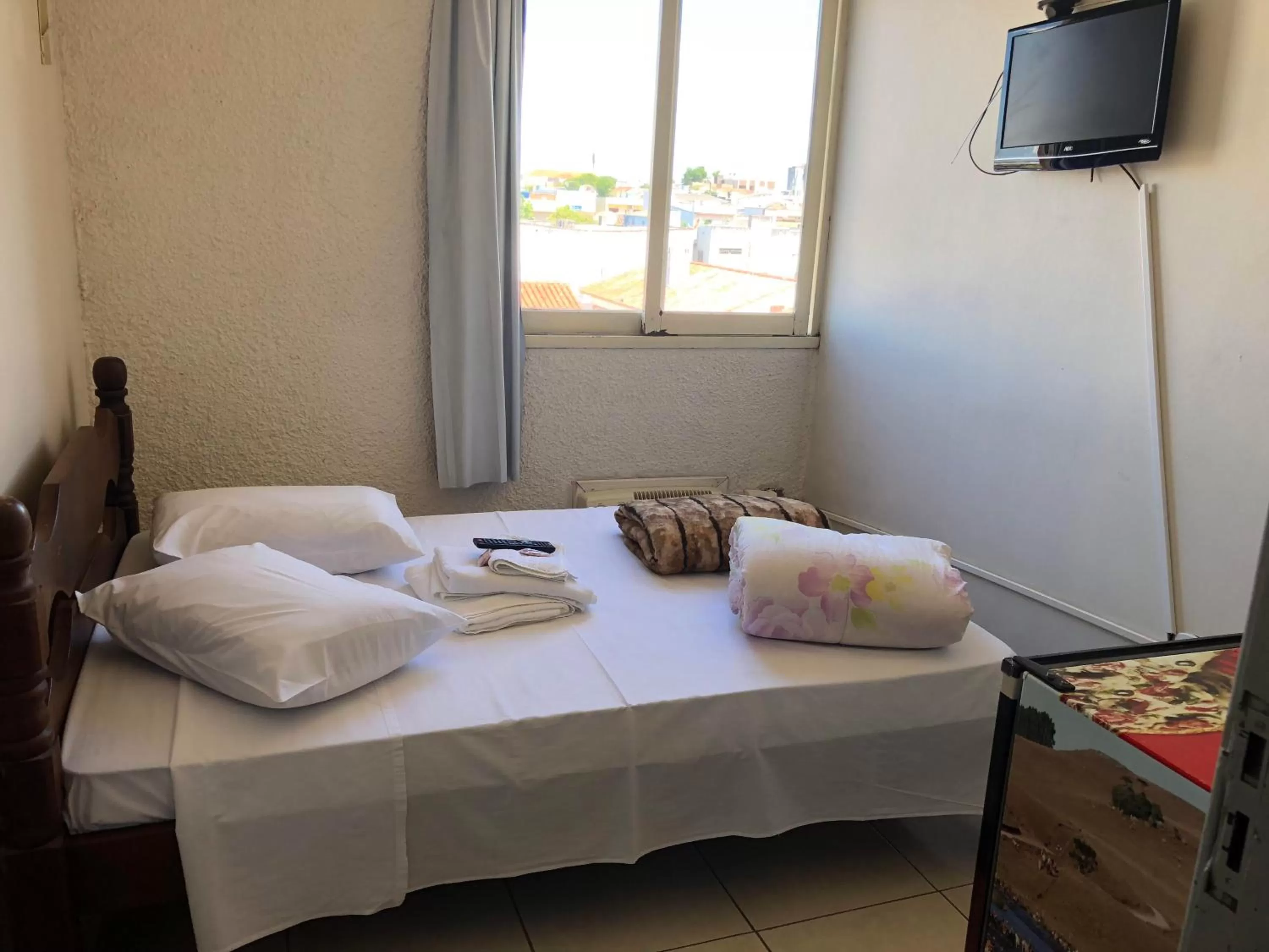 Bed in Hotel Glória