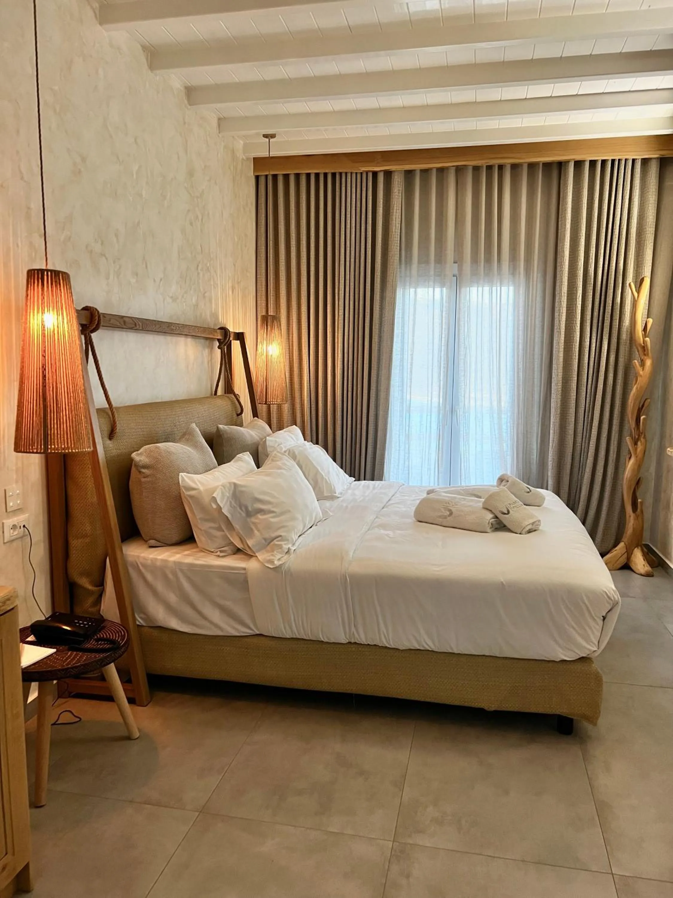 Bed in Panormos Village Hotel