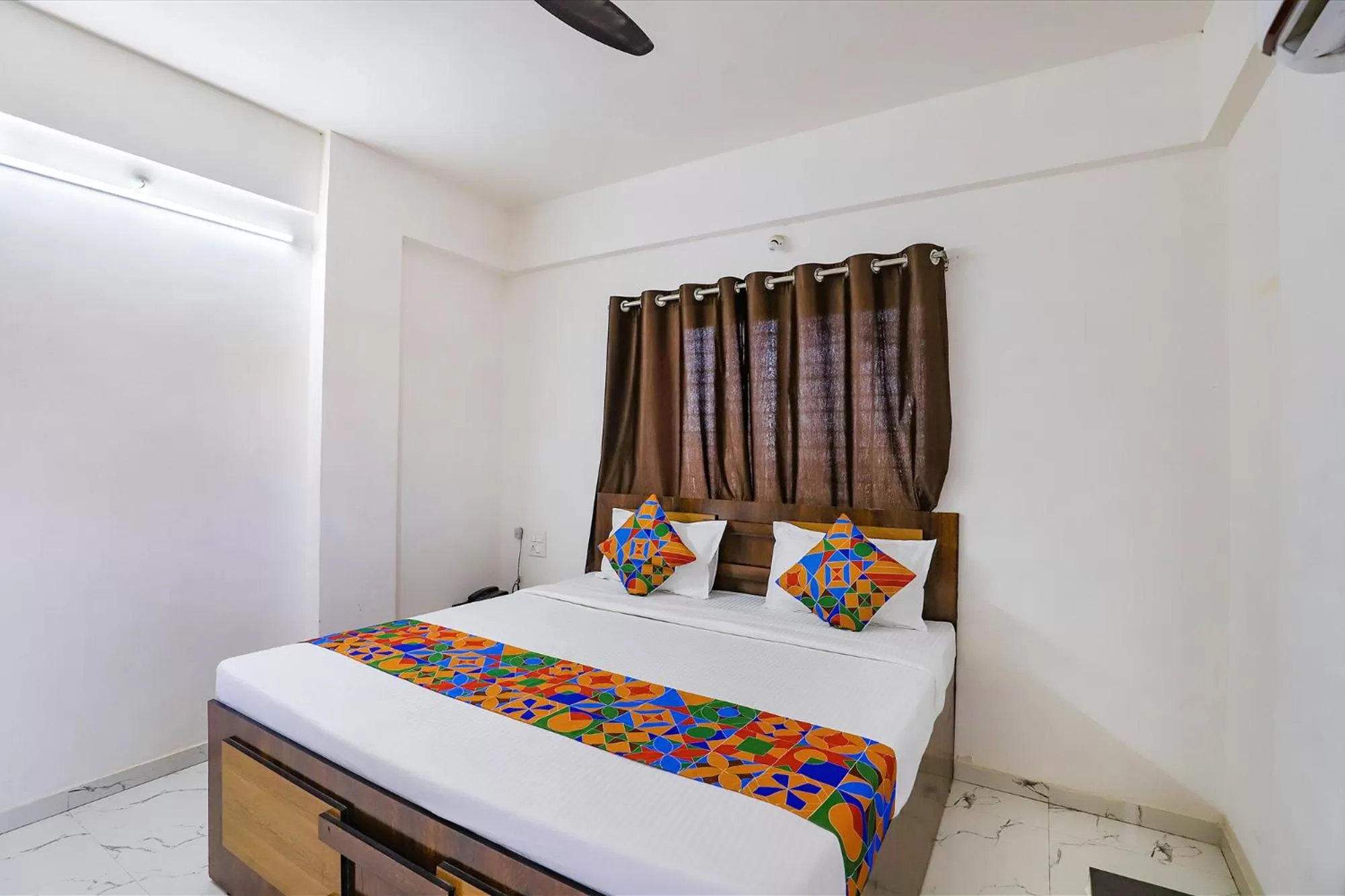 Bed in FabHotel Elite Palm